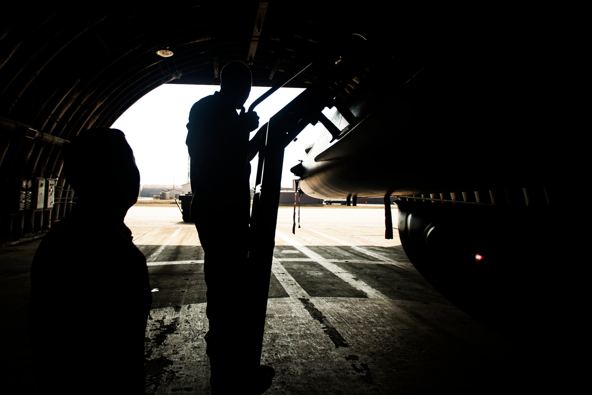 Marine Corps Cpl. Jake Balcom is shown an F-16 by Capt. Jay Doerfler, 421st Fighter Squadron chief of training, while touring the 421st FS March 26, 2014, at Osan Air Base, Republic of Korea. Balcom is the grandson of Col. Ralph Balcom, a Vietnam-war POW/MIA, who served with the 421st FS. (U.S. Air Force photo by Staff Sgt. Jake Barreiro)