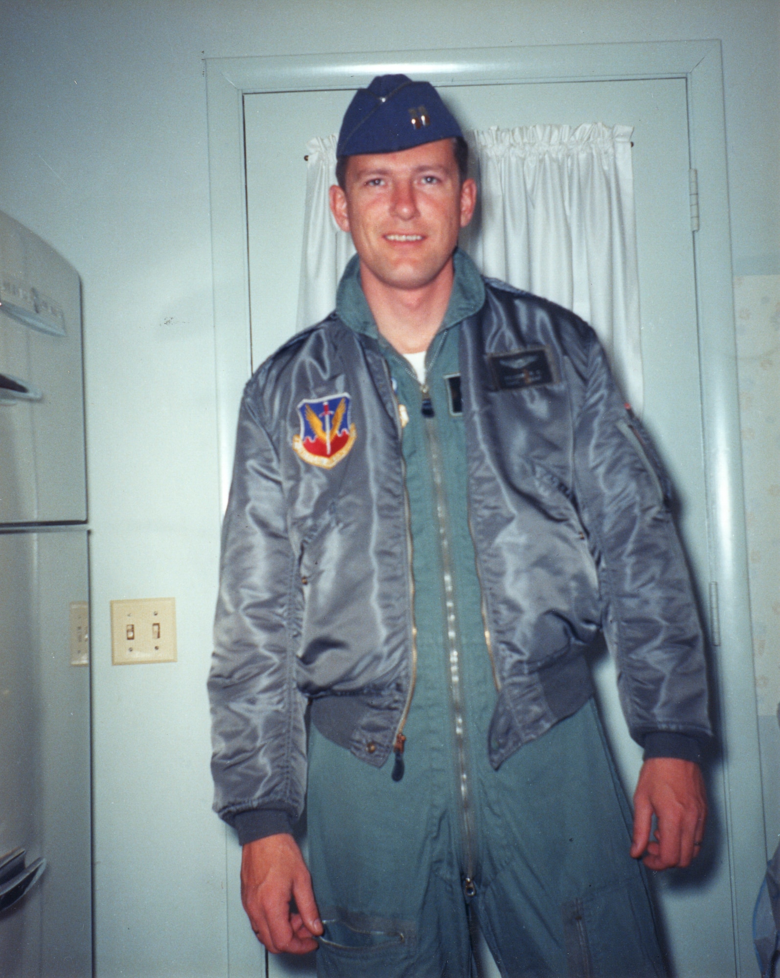 Capt. Ralph Balcom smiles in a picture taken by his wife, Marian, the morning he left home to serve in the Vietnam War. Balcom, who flew an F-105 Thud in the 421st Tactical Fighter Squadron, left behind his wife, a 7-year-old daughter, Tracy, and a 4-year-old son, Chris. (Photo courtesy of Marian Balcom Pratt)