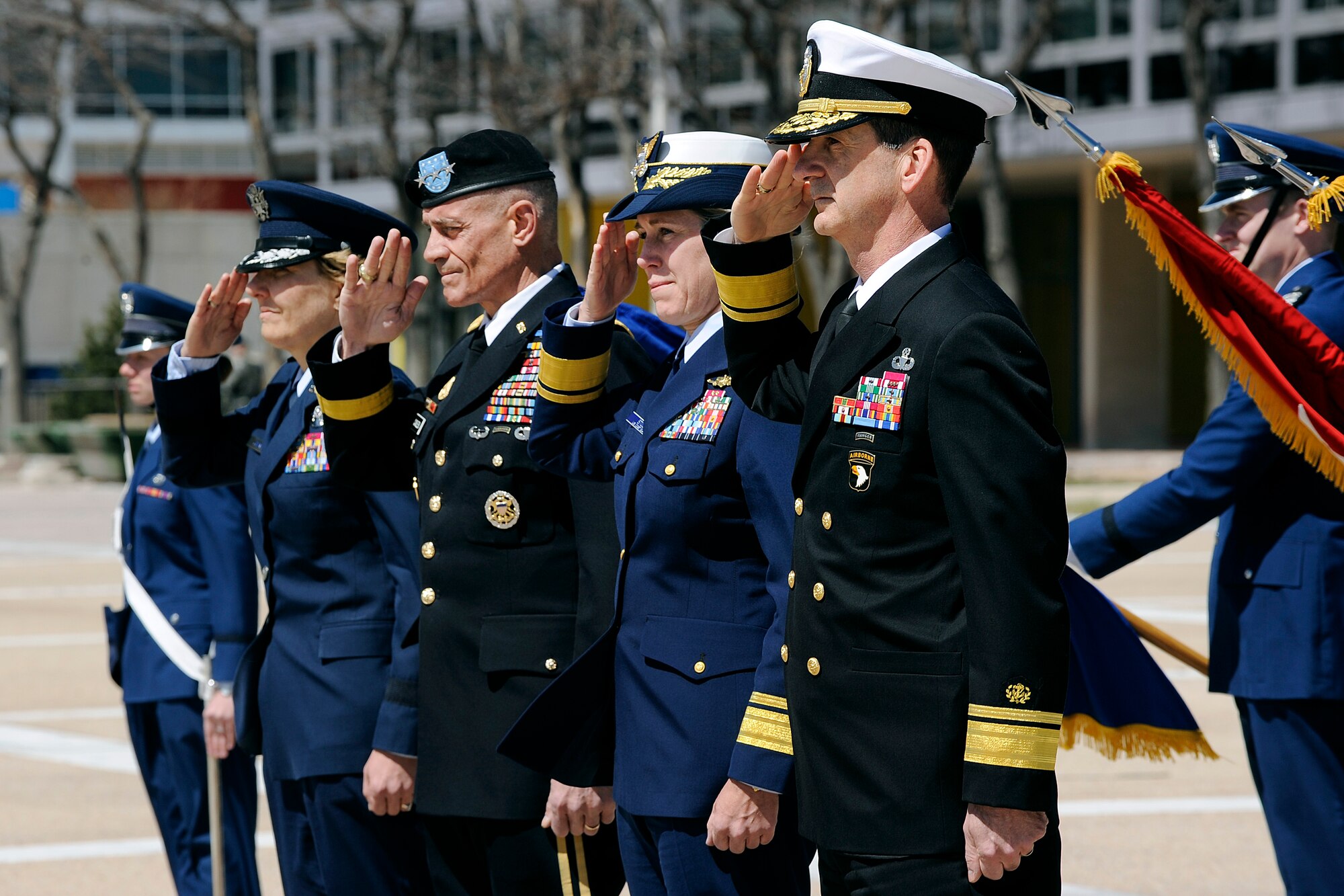 Left to right: Academy Superintendent Lt. Gen. Michelle D. Johnson, U.S. Military Academy Superintendent Lt. Gen. Robert Caslen Jr., U.S. Coast Guard Academy Superintendent Rear Adm. Sandra L. Stosz, and U.S. Merchant Marine Academy Superintendent Rear Adm. James A. Helis salute during the Cadet Wing parade in their honor here April 10. 