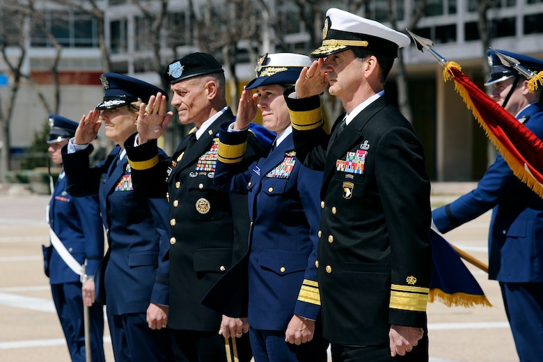 Left to right: Academy Superintendent Lt. Gen. Michelle D. Johnson, U.S. Military Academy Superintendent Lt. Gen. Robert Caslen Jr., U.S. Coast Guard Academy Superintendent Rear Adm. Sandra L. Stosz, and U.S. Merchant Marine Academy Superintendent Rear Adm. James A. Helis salute during the Cadet Wing parade in their honor here April 10. 