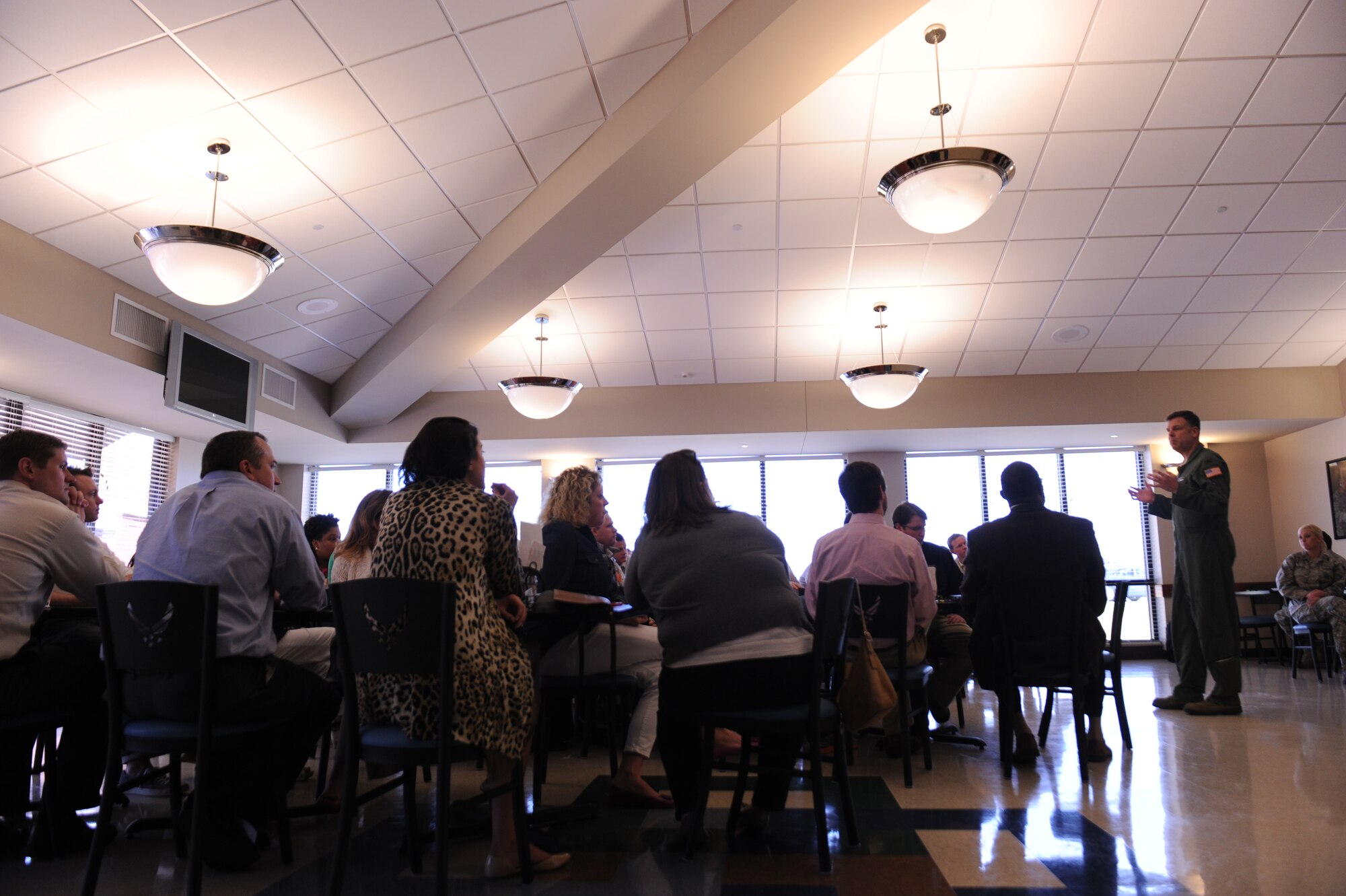 Col. Scott Brewer, 314th Airlift Wing commander, briefs the Leadership Greater Little Rock tour as they arrive at the Hercules Dining Facility April 10, 2014, at Little Rock Air Force Base, Ark. The group learned how the base contributes to the economic development and quality of life within the state. (U.S. Air Force photo by Airman 1st Class Cliffton Dolezal)