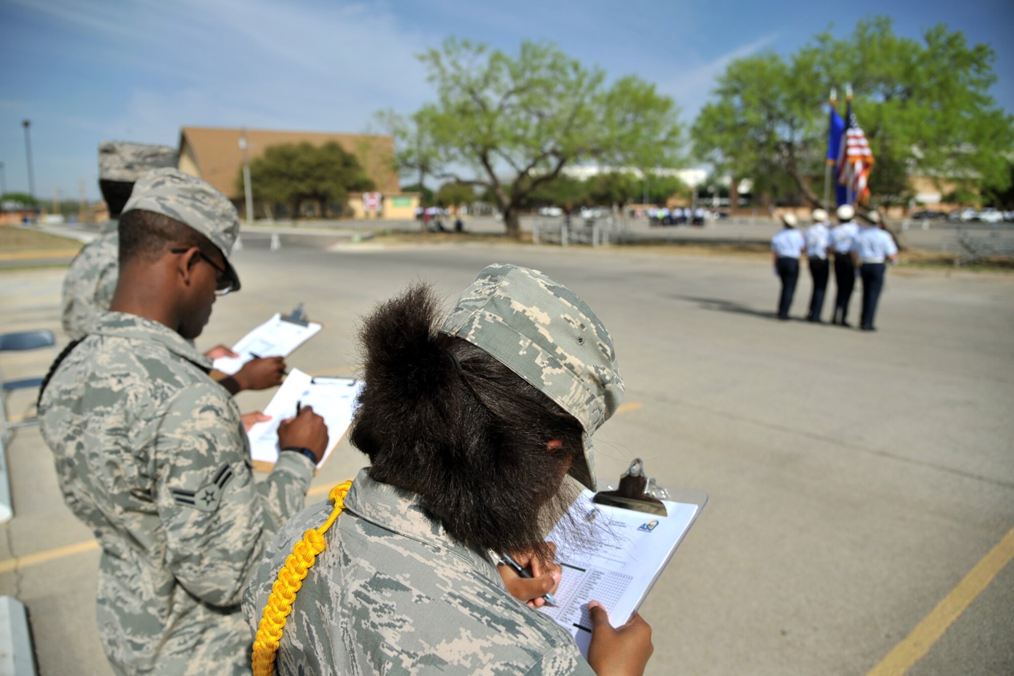 SAN ANGELO, Texas – Goodfellow Air Force Base students judge a color guard drill routine at Angelo State University’s annual Junior ROTC Drill Meet here April 12. During the routine, judges deducted points for any drill movement infractions or discrepancies. (U.S. Air Force photo/ Airman 1st Class Devin Boyer)
