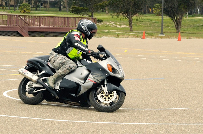 Tech. Sgt. Donald Berendt, 30th Civil Engineer Squadron motorcycle safety representative, takes his bike through a newly constructed safety course, April 15, 2014, Vandenberg Air Force Base, Calif. After an almost two-decade hiatus, VAFB will once again offer motorcycle safety courses on the installation. (U.S. Air Force photo/ Senior Airman Shane Phipps)
