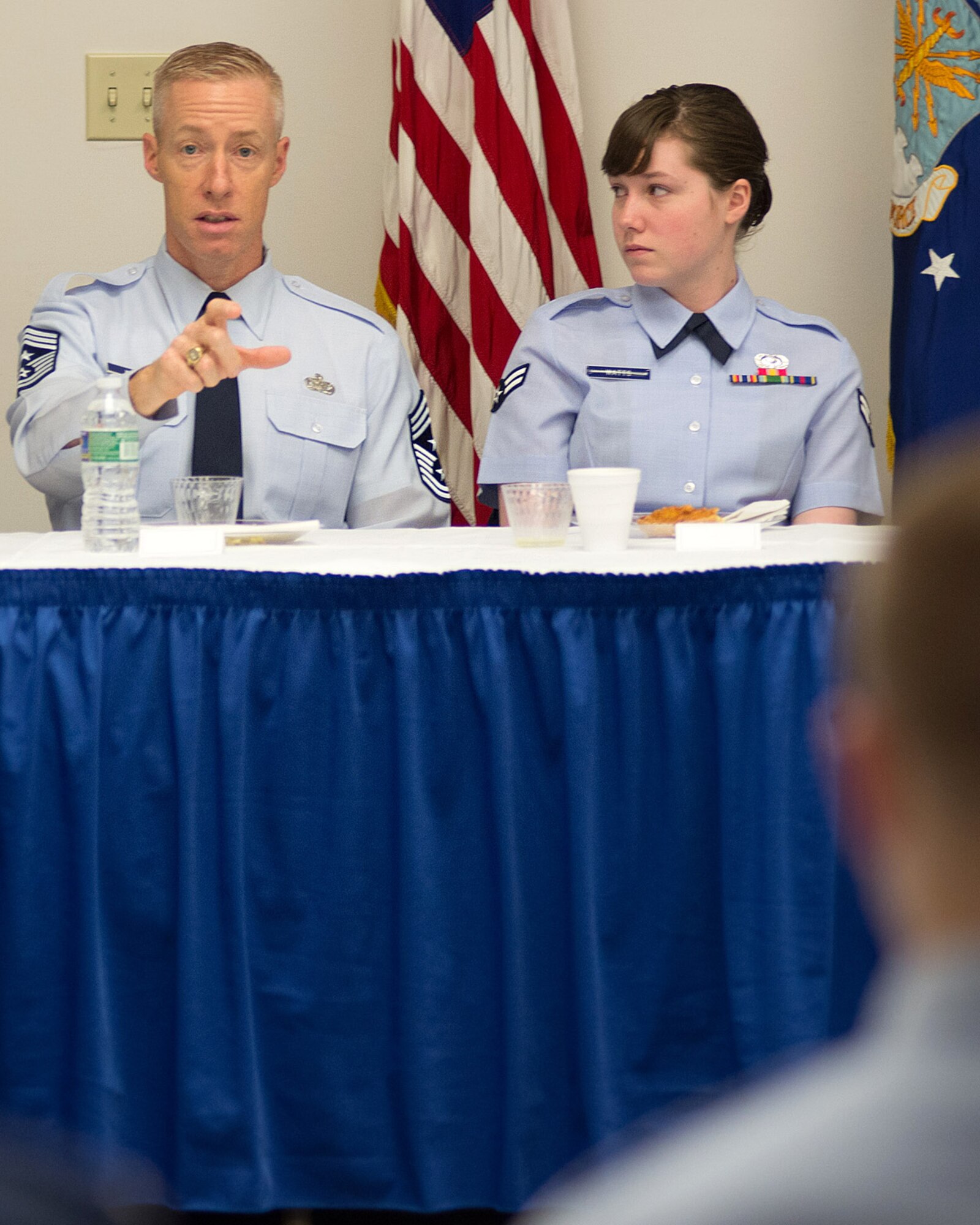 HANSCOM AIR FORCE BASE, Mass. – Command Chief Master Sgt. Michael Warner, Air Force Materiel Command’s senior enlisted member, answers a question from Airman during an enlisted breakfast at the Minuteman Commons, April 15, as Airman 1st Class Kara Watts looks on. Warner and Gen. Janet Wolfenbarger, commander of Air Force Materiel Command, visited the base April 14-16 to meet with Airmen. (U.S. Air Force photo by Rick Berry)