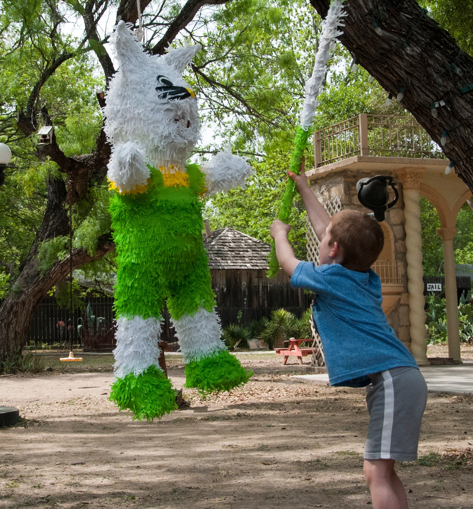 A boy bats at a piñata at the Whitehead Memorial Museum in Del Rio, Texas, April 12, 2014. Businesses and organizations from Del Rio donated decorations, food, supplies and time to making the event possible. (U.S. Air Force photo/Airman 1st Class Jimmie D. Pike/Released)