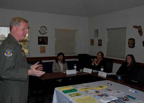 Brig. Gen. David Harris, the 96th Test Wing commander, praises Eglin’s new Key Spouses for volunteering their service to Eglin’s military families, at the Key Spouses orientation training April 16 at the Airman and Family Readiness Center.  (U.S. Air Force photo/Kevin Gaddie) 