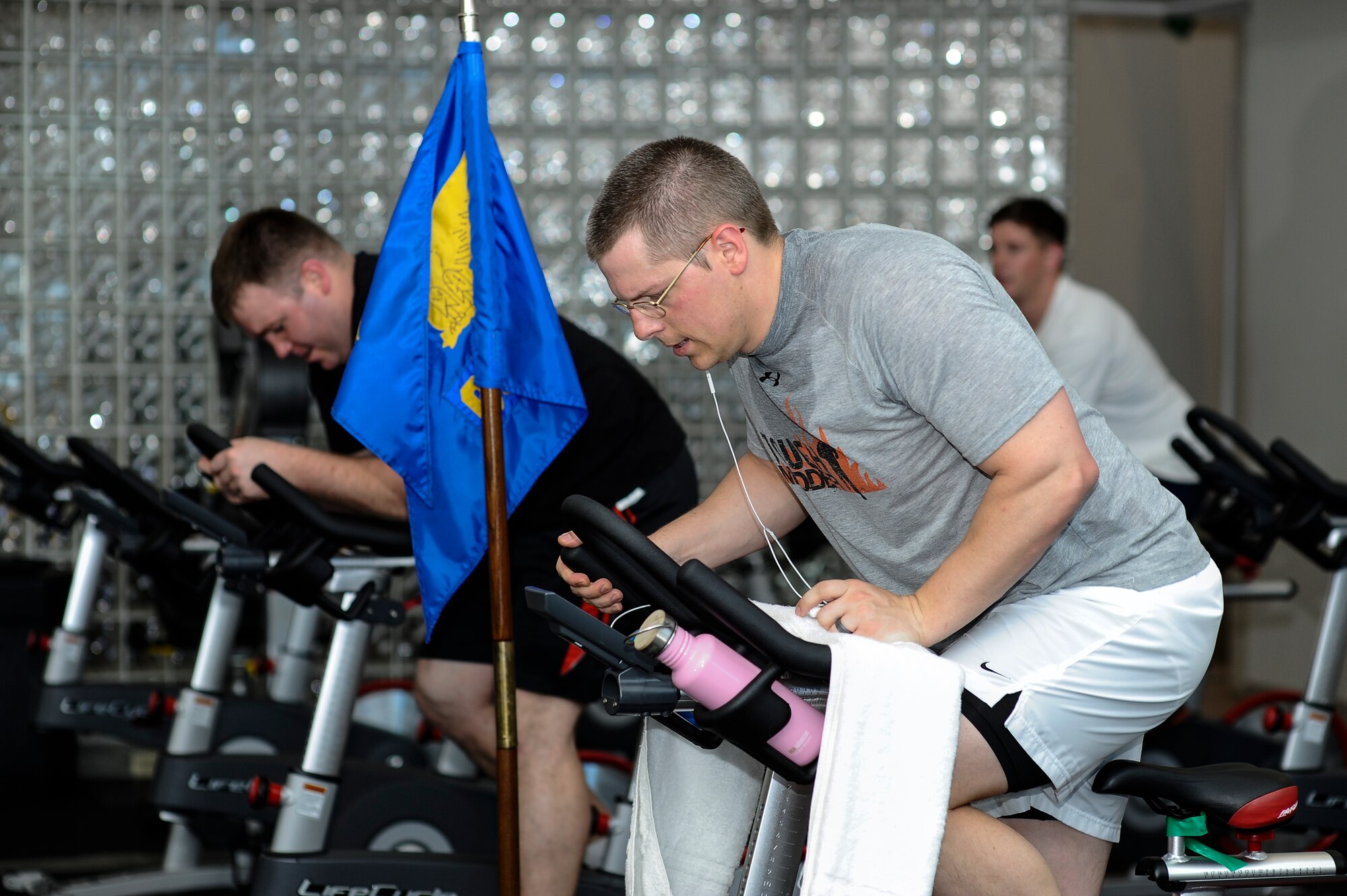 Team Buckley members work up a sweat during Buckley’s annual Spin-A-Thon, April 11, 2014, at the fitness center on Buckley Air Force Base, Colo. Every hour, one person from each 460th Space Wing unit participated in a 45-minute spin class, competing for Commander’s Cup points. (U.S. Air Force photo by Airman 1st Class Samantha Saulsbury/Released)