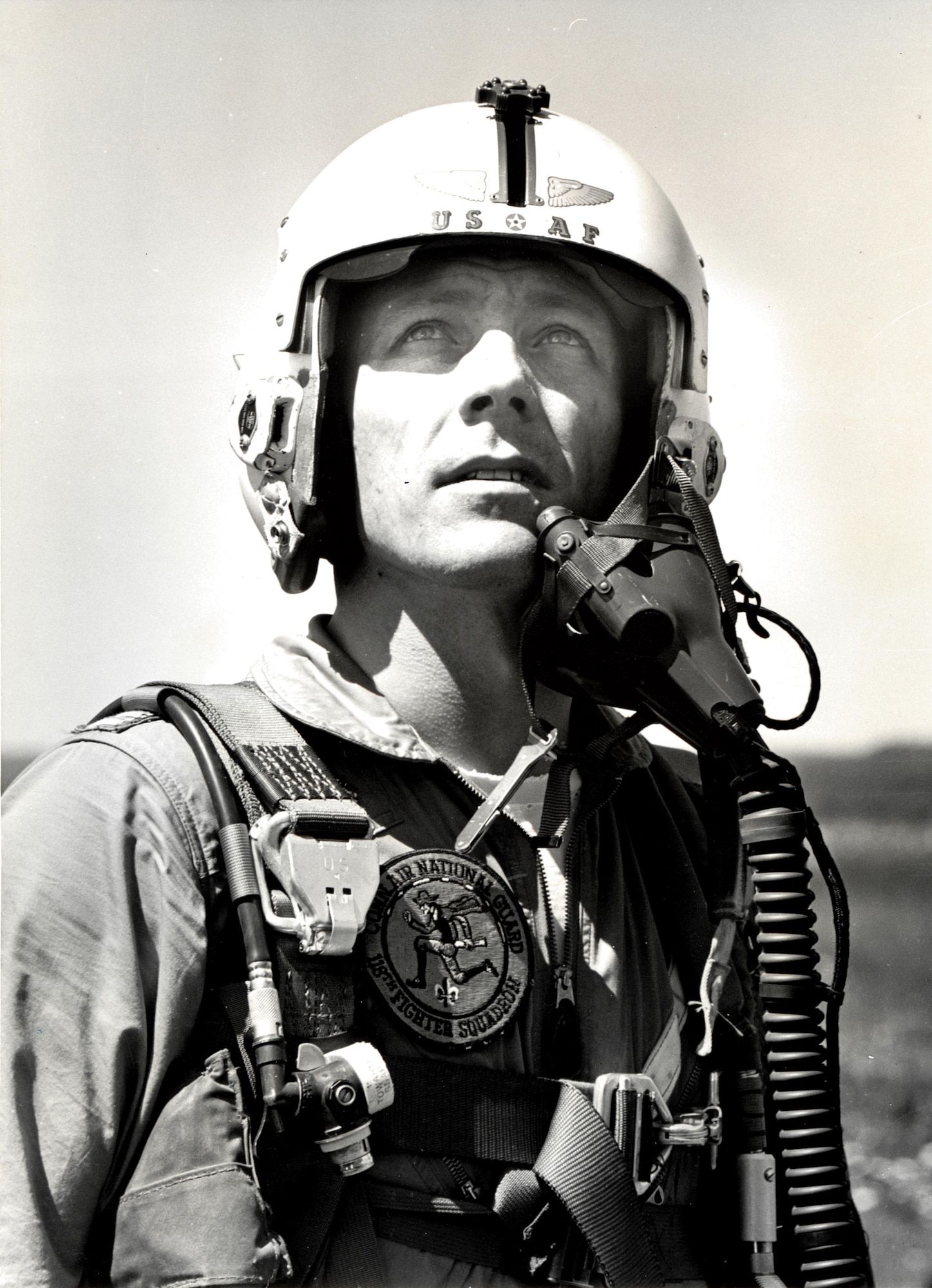 The late John L. Swigert Jr. in his flight suite adorned with a 118th Fighter Squadron patch, circa 1965. (U.S. Air National Guard file photo)