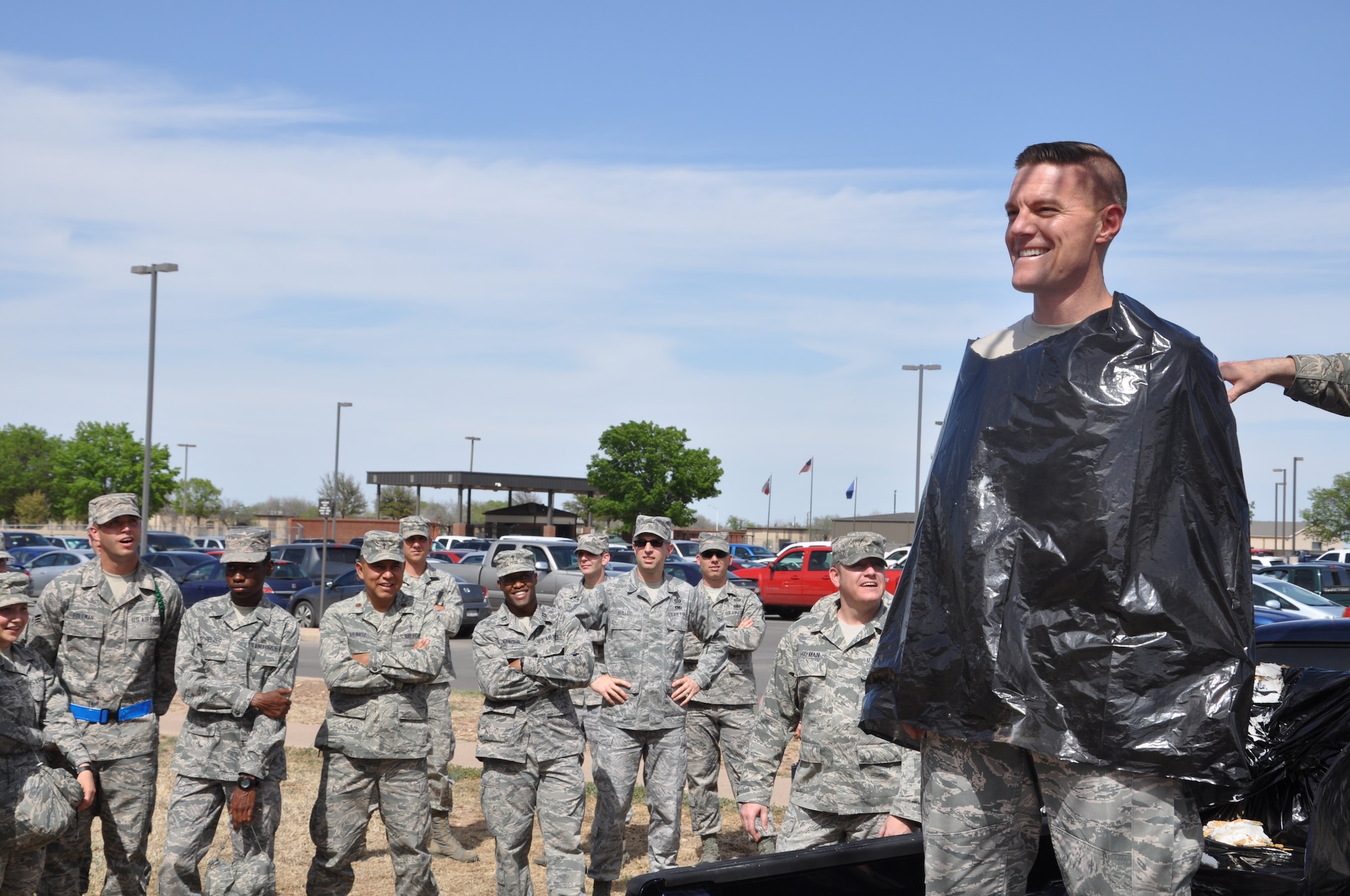 GOODFELLOW AIR FORCE BASE, Texas – Col. Brendan M. Harris, 17th Training Group Commander, prepares to get a pie in his face during an Air Force Assistance Fund event outside the 315th TRS here Aug. 11. Goodfellow achieved their goal of 100 percent contact and rose over $15,000 for the AFAF. (U.S. Air Force photo/ Tech. Sgt. Jared Whitecar)