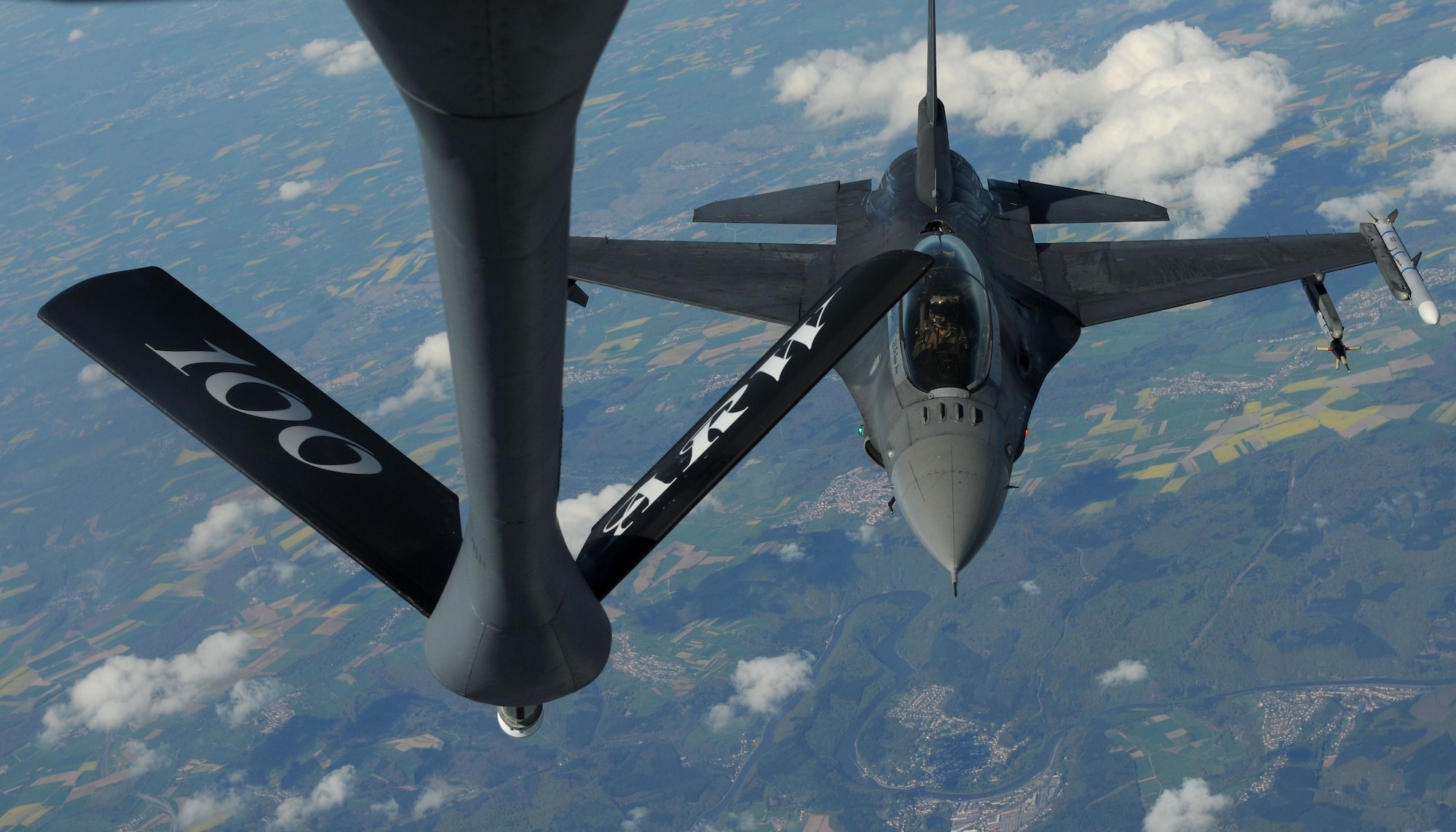 An F-16 Fighting Falcon from Spangdahlem Air Base, Germany, approaches the boom of a KC-135 Stratotanker from RAF Mildenhall, England, April 16, 2014, during an air refueling sortie over Germany. Tankers enable the U.S. and its allies the capability to maintain air superiority across the globe. The 100th Air Refueling Wing's tanker fleet is responsible for the whole European theater. (U.S. Air Force photo by Senior Airman Kate Maurer/Released)