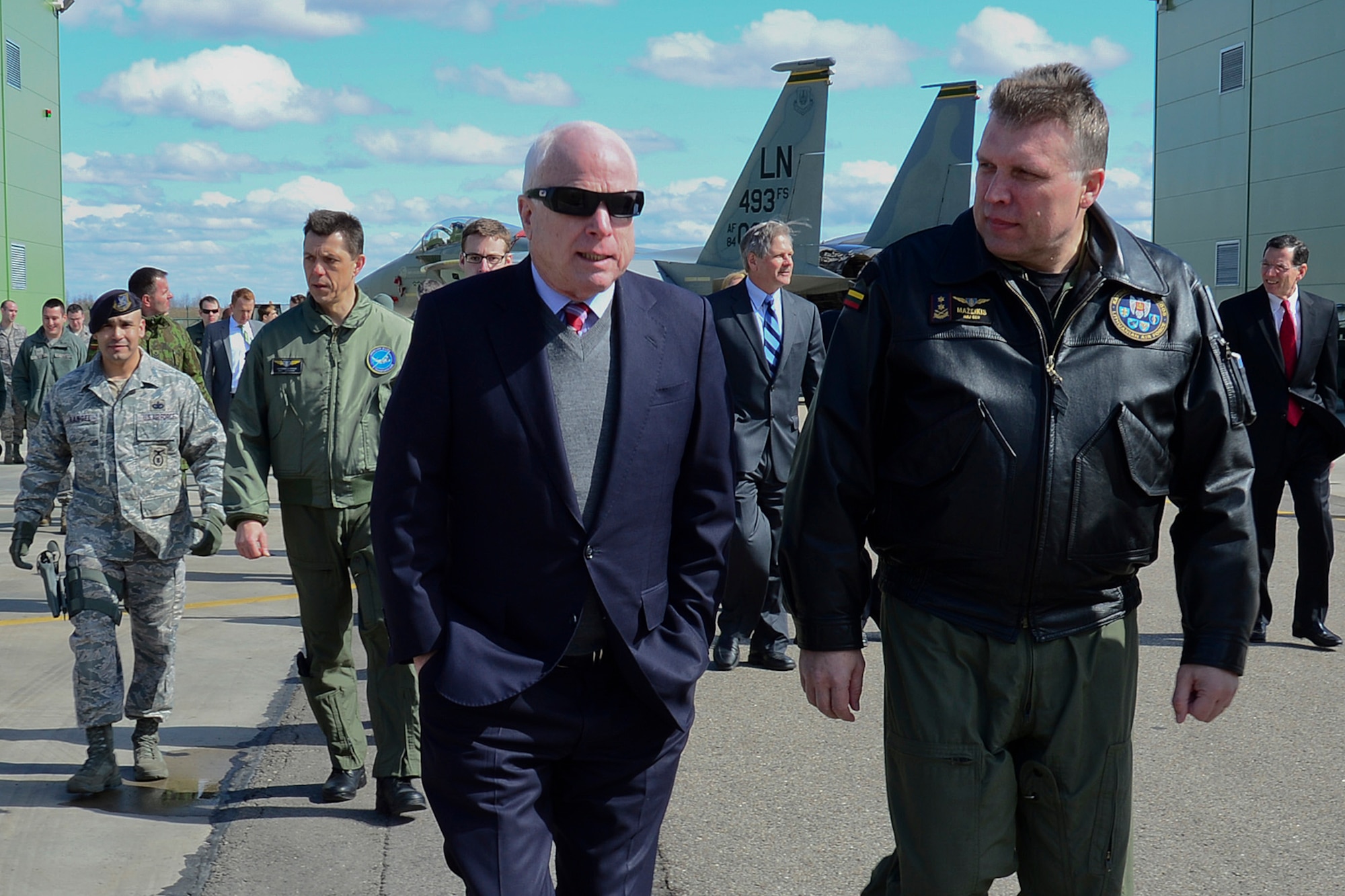 U.S. Senator John McCain speaks with Maj. Gen. Edvardas Mažeikis, Lithuanian air force commander, at Šiauliai Air Base, Lithuania, April 16, 2014. McCain and U.S. Senators John Hoeven and John Barrasso visited the Baltic Air Policing mission as part of a visit to the greater Baltic region, which also includes meetings with government officials in Estonia, Latvia, and Moldova. (U.S. Air Force photo by Airman 1st Class Dana J. Butler/Released)