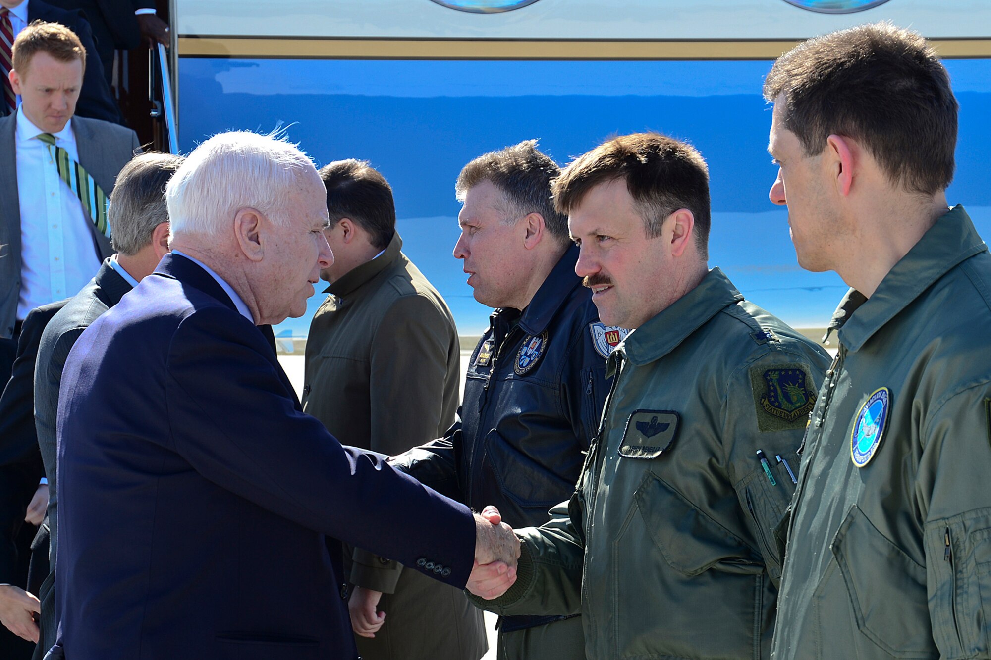 Lt. Col. Lendy Renegar, 48th Air Expeditionary Group commander, greets U.S. Senator John McCain after landing at Šiauliai Air Base, Lithuania, April 16, 2014. McCain and U.S. Senators John Hoeven and John Barrasso visited the Baltic Air Policing mission as part of a visit to the greater Baltic region, which also includes meetings with government officials in Estonia, Latvia, and Moldova. (U.S. Air Force photo by Airman 1st Class Dana J. Butler/Released)