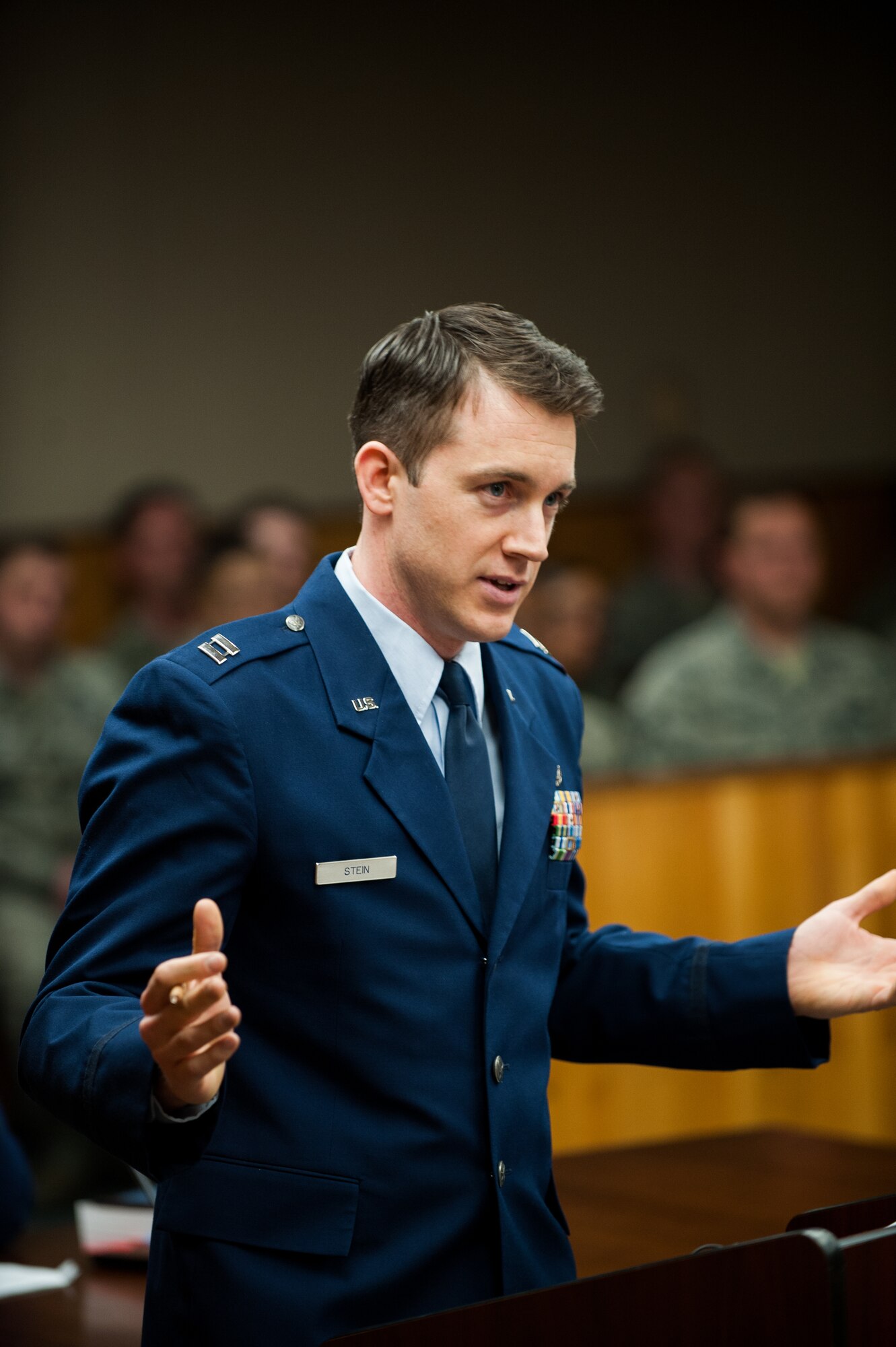 Capt. Christopher Stein, 8th Fighter Wing deputy staff judge advocate, cross examines a defendant during a mock trial at Kunsan Air Base, Republic of Korea, April 16, 2014. The Wolf Pack puts on a mock trial of a sexual assault case for First Term Airman Center students to provide a realistic view of the military justice system. (U.S. Air Force photo by Staff Sgt. Clayton Lenhardt/Released)