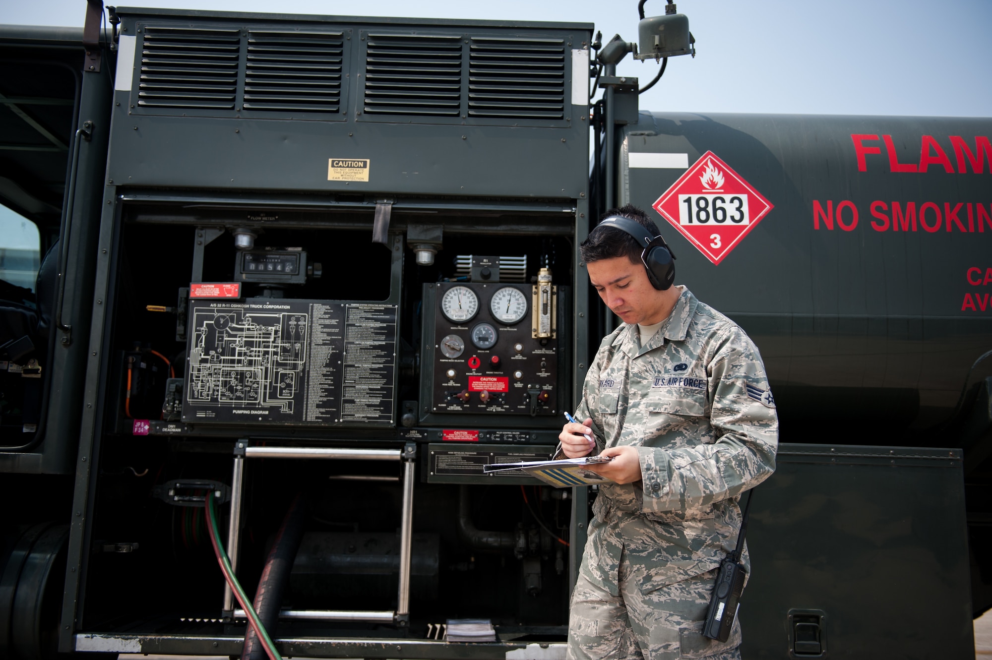 Senior Airman Jacob Rickard, 8th Logistics Readiness Squadron fuels distribution operator, logs an F-16 Fighting Falcon’s stats during a refueling operation at Kunsan Air Base, Republic of Korea, April 10, 2014. The 8th LRS fuels management flight keeps the Wolf Pack running by delivering fuel when and where it is needed. (U.S. Air Force photo by Staff Sgt. Clayton Lenhardt/Released)