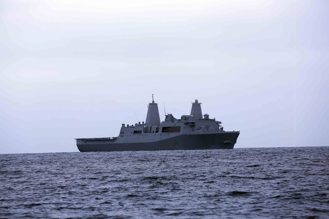 The USS San Diego leads the way during a straits transit exercise during Amphibious Squadron Marine Expeditionary Unit Integration Training (PMINT) off the coast of San Diego, April 17, 2014. PMINT is conducted by the 11th MEU and the Makin Island Amphibious Ready Group and is the first opportunity for the MEU/ARG team to exercise its planning processes and execute sea-based operations at sea. (U.S. Marine Corps photo by Cpl. Jonathan R. Waldman/RELEASED)