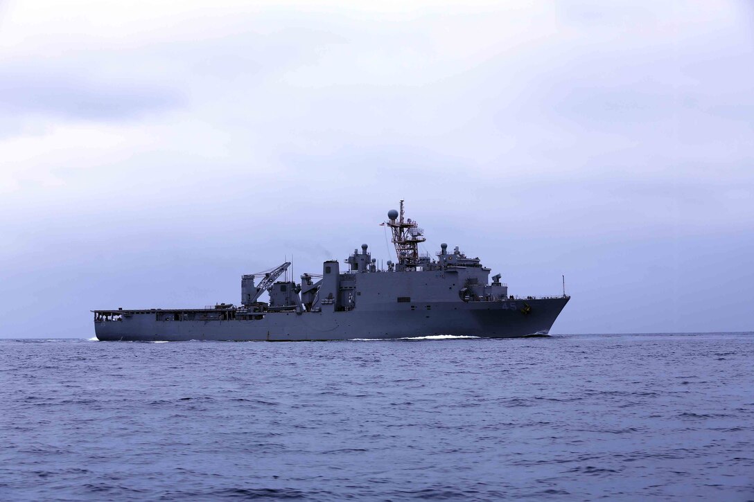 The USS Comstock sails during Amphibious Squadron Marine Expeditionary Unit Integration Training (PMINT) off the coast of San Diego, April 17, 2014 PMINT is the first opportunity for the 11th MEU and the Makin Island Amphibious Ready Group team to exercise its planning processes and conduct sea-based operations. (U.S. Marine Corps photo by Cpl. Jonathan R. Waldman/RELEASED)