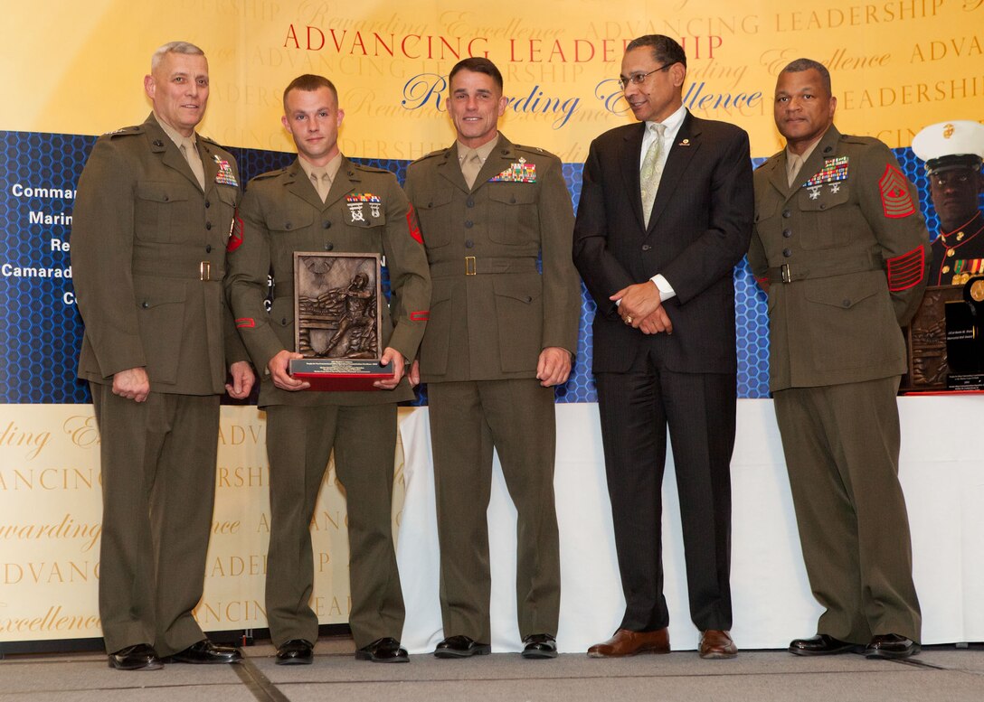 The Assistant Commandant of the Marine Corps, Gen. John M. Paxton, Jr., attends the U.S. Marine Corps Command, Control, Communications and Computers, annual awards dinner in Arlington Va., April 17, 2014. The awards presented included the Gen. Alfred M. Gray Trophy for outstanding communications leadership, the James Hamilton Information Technology Management Civilian Marine of the Year Award, the Pfc. Herbert A Littleton Non Commissioned Officer Trophy for operational communications excellence, and the Lt. Col. Kevin M. Shea Memorial Unit Award. (U.S. Marine Corps photo by Cpl. Tia Dufour/Released)