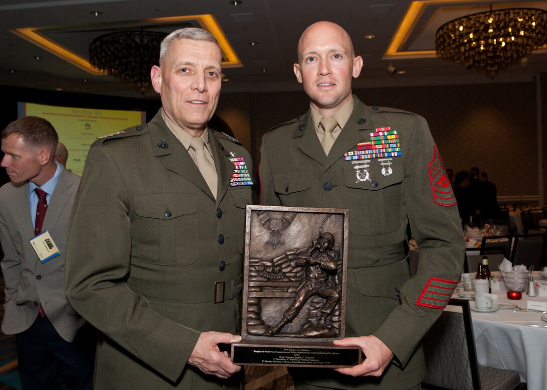 The Assistant Commandant of the Marine Corps, Gen. John M. Paxton, Jr., attends the U.S. Marine Corps Command, Control, Communications and Computers, annual awards dinner in Arlington Va., April 17, 2014. The awards presented included the Gen. Alfred M. Gray Trophy for outstanding communications leadership, the James Hamilton Information Technology Management Civilian Marine of the Year Award, the Pfc. Herbert A Littleton Non Commissioned Officer Trophy for operational communications excellence, and the Lt. Col. Kevin M. Shea Memorial Unit Award. (U.S. Marine Corps photo by Cpl. Tia Dufour/Released)