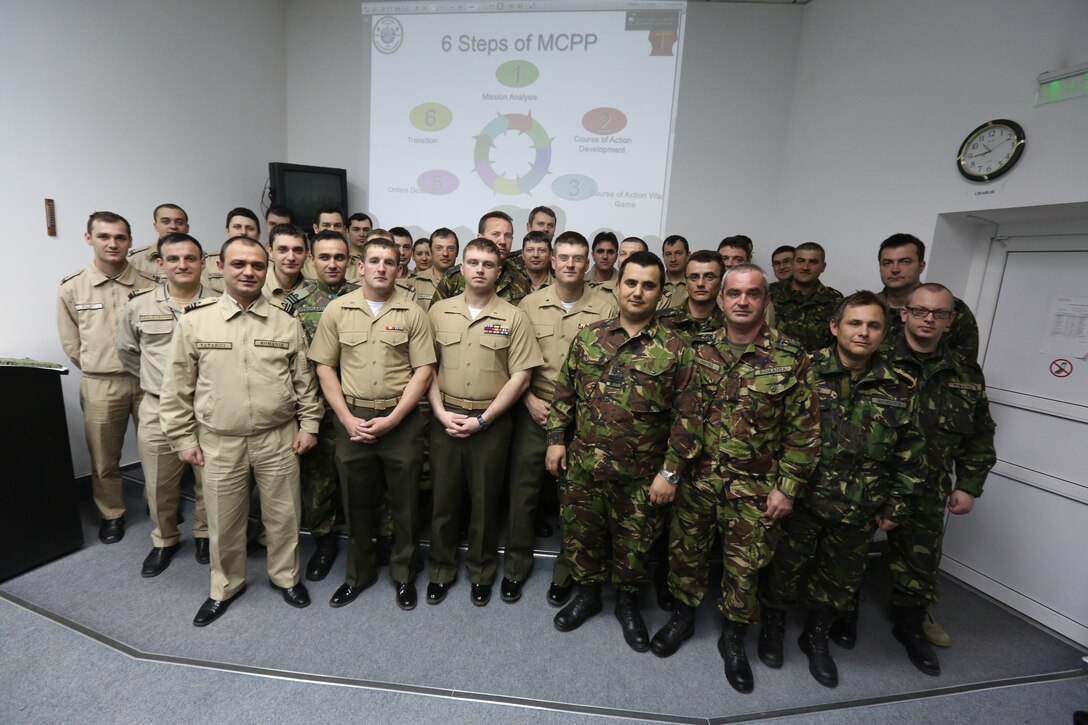 U.S. Marines of Black Sea Rotational Force 14 from 3rd Battalion, 8th Marine Regiment, 2nd Marine Division, provide a period of instruction on combat decision making in Constanta, Romania, April 17, 2014. Black Sea Rotational Force- 14 is a contingent of Marines and sailors in the Black Sea, Balkans and Caucasus regions that work with partner nations to maintain proven partnerships while building military capacity, promoting regional stability, and providing the capability for rapid crisis response throughout Eastern Europe as directed by U.S. Marine Corps Forces Europe and Africa, U.S. European Command.