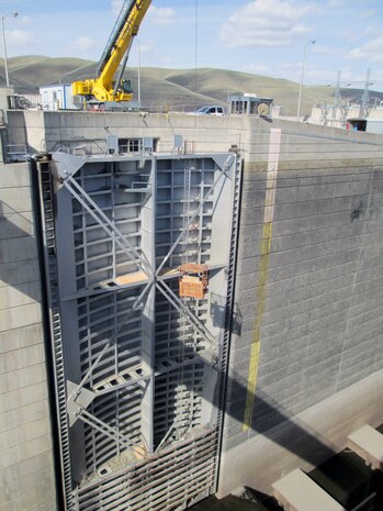 Personnel work platforms and fall-protection systems were installed April 15 in preparation for diagonal tensioning work. 