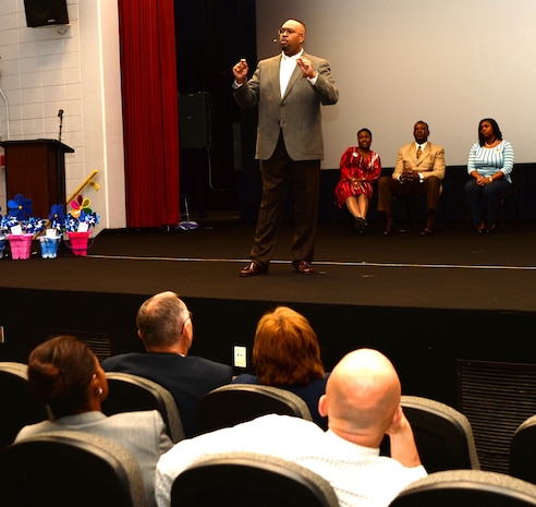 Dr. Ken Miller, senior pastor, Administering Grace Church and Spiritual Life Center, Albany, Ga., spoke at the Base Theater Tuesday during the Child Abuse Awareness Proclamation Ceremony.