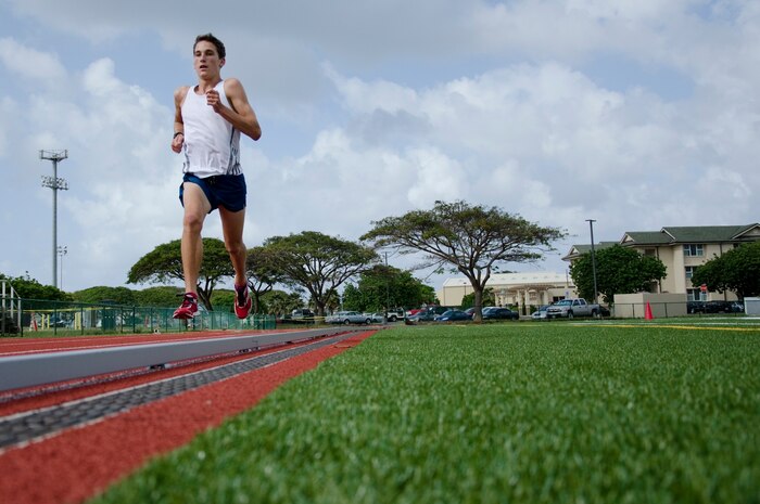 Makai Clemons, an 11th-grader, received first place in the Boys 1,500 and 3,000 Meter-Run Varsity events during the 2014 Oahu Interscholastic Association Varsity Eastern Division Track Championship at Kaiser High School in Honolulu, April 5, 2014. "He's very dedicated as far as his diet, his workout (and) his sleep," said Clemons' mother, Malia, the family readiness officer of Marine Light Attack Helicopter Squadron 367. "He trains year-round." When Makai initially chose to participate in cross-country, he started running with his parents and was hooked, and joined track and field. "I'm proud of (my accomplishments)," Makai said. "Since last year especially, I've come a long way. I think the beginning of last year my (3,000-meter run) time was 10.15 and I brought it down to 9 minutes flat. But there's still work to be done, (more goals) I want to achieve." Makai is currently qualified to compete in the Hawaii High School Athletic Association Championship. (U.S. Marine Corps photo by Kristen Wong)


