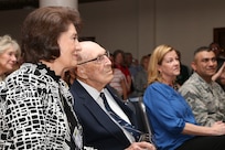 Retired Lt. Col. Richard Cole, second from left, co-pilot of Aircraft No. 1 of the Doolittle Tokyo Raid, and his daughter, Cindy Chal, at left, listen during the 72nd Doolittle Tokyo Raiders anniversary celebration event April 18 at the JBSA-Randolph Parr Club.  Cole is one of four remaining survivors from the Doolittle Tokyo Raid of 1942.  (U.S. Air Force photo/Dan Solis)