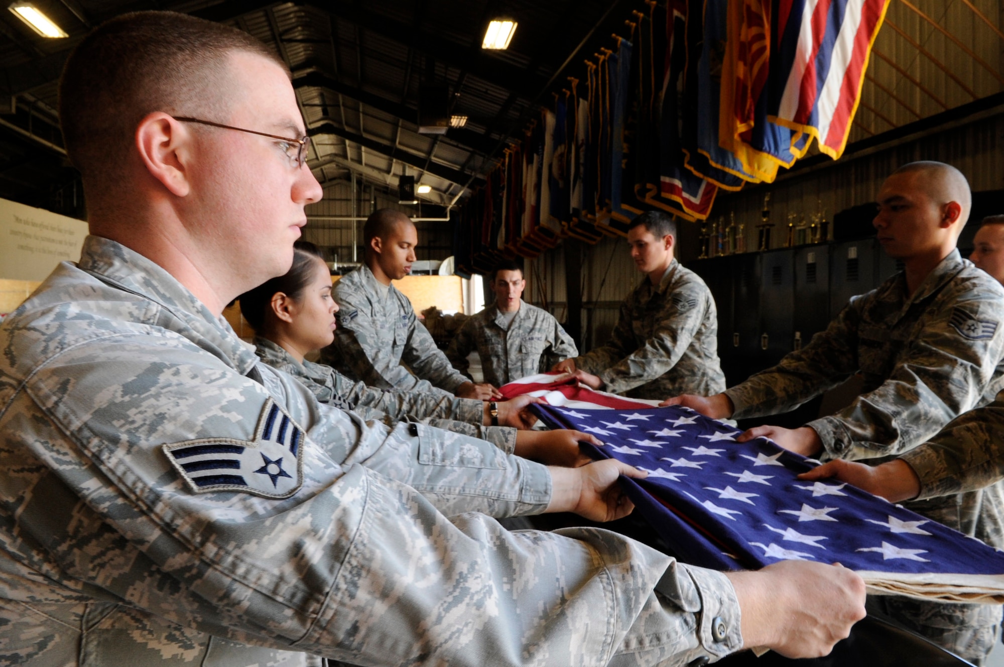 Senior Airman Scott Clark, 30th Comptroller Squadron lead defense travel administrator, and his base Honor Guard teammates practice ceremonial techniques, April 16, 2014, Vandenberg Air Force Base, Calif. For decades base Honor Guards have represented all Airmen to the American public and the world by showcasing their skills at various functions, from funerals to retirement ceremonies. (U.S. Air Force photo/ Senior Airman Shane Phipps)