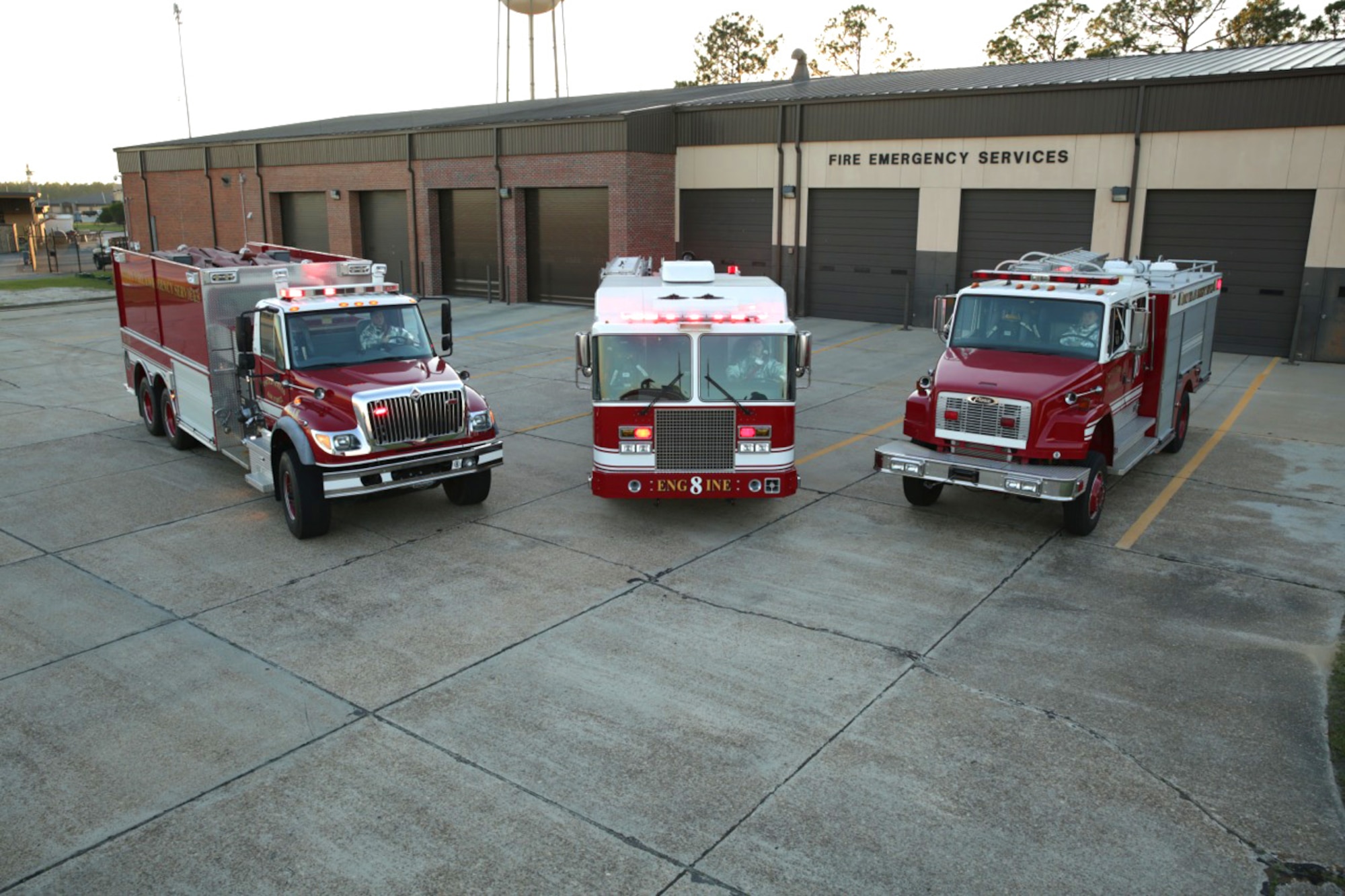 Idle reduction technology will be available on more than 100 new Air Force water tankers, structural pumpers and rescue trucks delivered over the next two years. IRT is a feature that automatically transitions the truck from the engine to an on-board auxiliary power unit, or generator, after the truck has been idling for two minutes. This helps reduce fuel use, carbon emissions, and wear and tear on the vehicle’s main engine. (U.S. Air Force photo/Eddie Green)