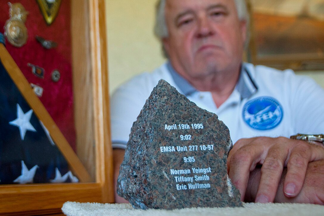 A piece of debris from the Alfred P. Murrah Federal Building lies on Norman Yeingst’s desk as a daily reminder of the Oklahoma City bombing that took place April 19, 1995. He is currently an installation emergency manager at Sheppard Air Force Base, Texas. (U.S. Air Force photo by Airman 1st Class Jelani Gibson) 
