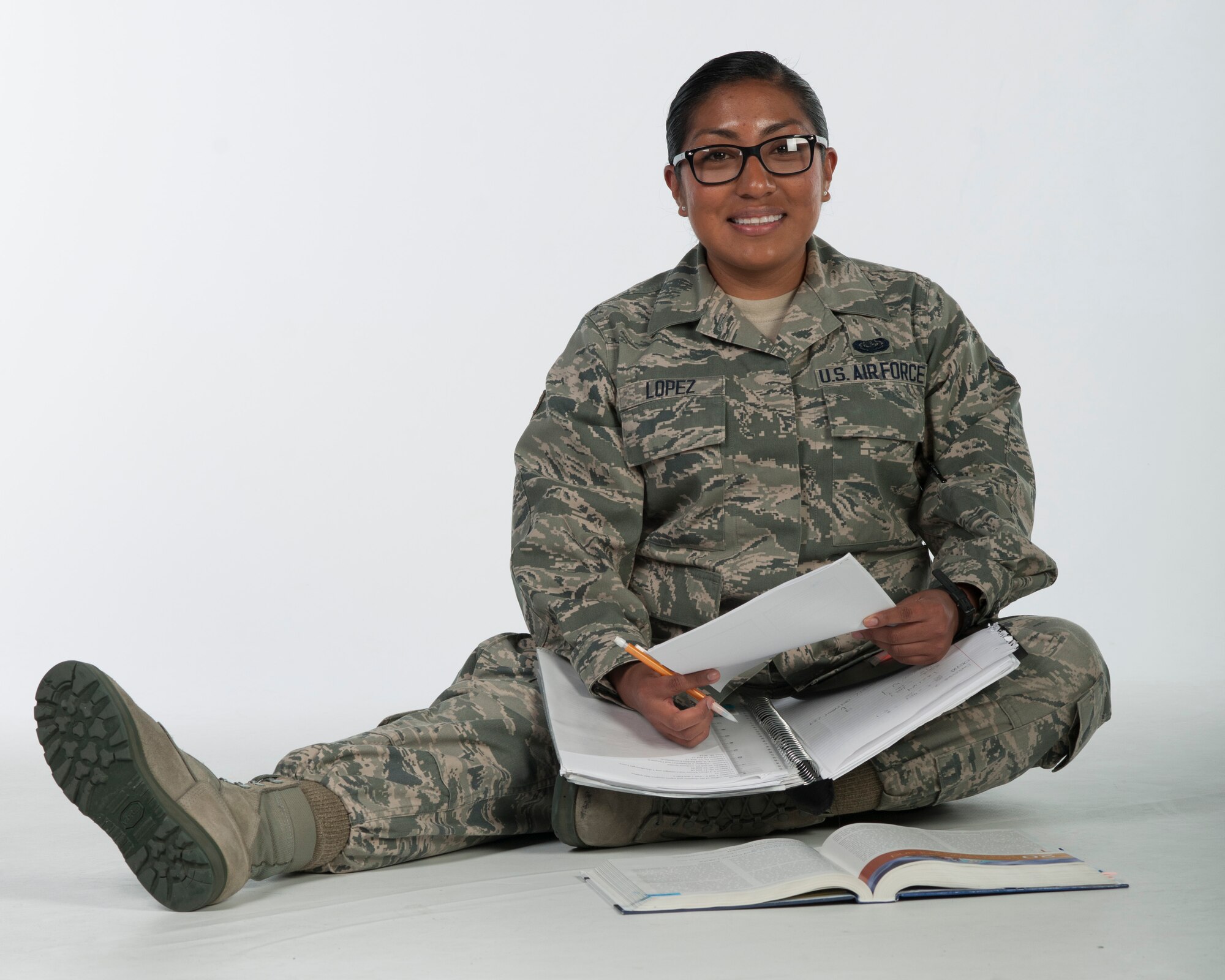 Airman 1st Class Jasmin Lopez, 30th Space Communications Squadron cyber system operator, is a full-time Airman and part-time student. Lopez is currently taking “Economics for Decision Making” class to work towards her master’s degree. (U.S. Air Force photo/ Airman 1st Class Veronique Henry)