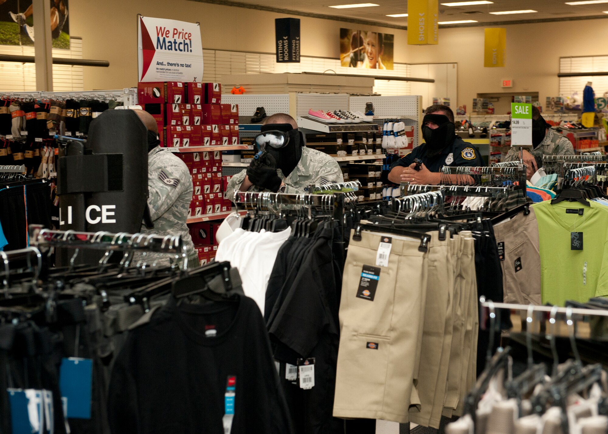 49th Security Forces Squadron patrolmen respond to the active shooter exercise inside the Base Exchange at Holloman Air Force Base, N.M., April 17. Holloman maintains readiness to respond to emergencies such as active shooters by conducting training exercises multiple times a year.  The 49th SFS and the 49th Civil Engineer Squadron were able to quickly respond to the exercise scenario, neutralize the threats and evacuate the victims. (U.S. Air Force photo by Senior Airman Daniel Liddicoet/Released)