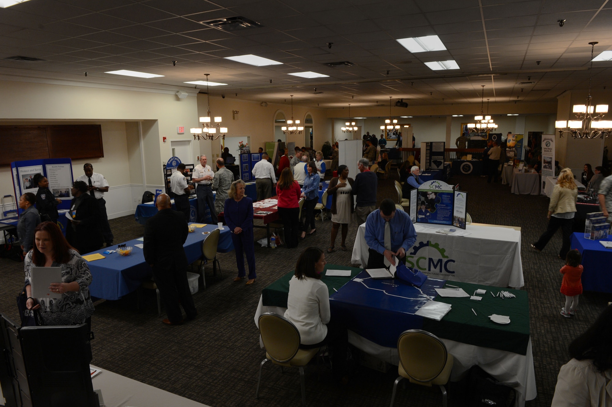 More than 200 team Shaw members attended a job fair at the Carolina Skies Club Shaw Air Force Base, S.C., April 17, 2014. Attendees were able to browse approximately 50 business representatives ranging from medical careers to law enforcement. (U.S. Air Force photo by Airman 1st Class Jensen Stidham/Released)