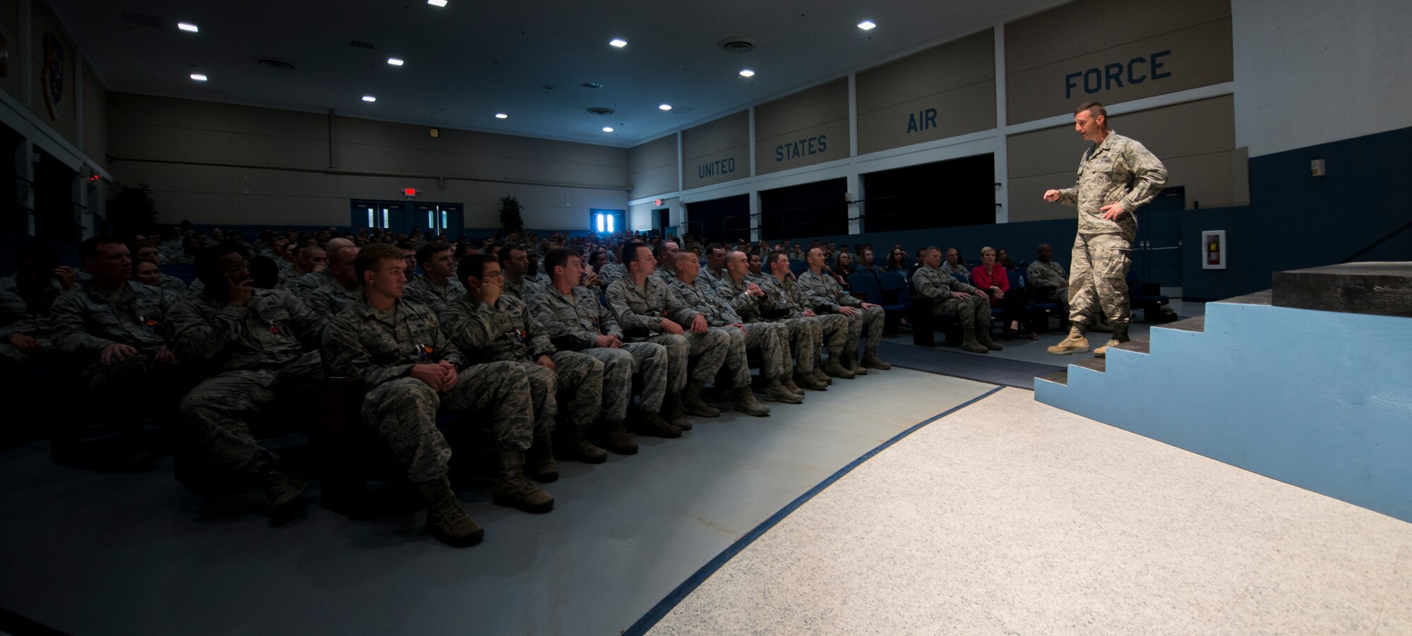 U.S. Air Force Col. Paul Kasuda, 820th Base Defense Group commander, commends a group of award-winning Airmen after a medal presentation ceremony at Moody Air Force Base, Ga., April 17, 2014. Following the presentations, Kasuda reiterated the value of these awards and the Airmen’s actions that earned them. (U.S. Air Force photo by Airman 1st Class Ryan Callaghan/Released)