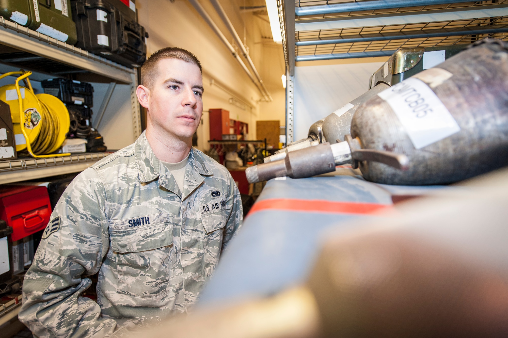 Senior Airman Richard Smith inventories tools during his shift at the 92nd Aircraft Maintenance Squadron’s consolidated tool kit at Fairchild Air Force Base, Wash., April 16, 2014. The 92nd AMXS CTK shop handles an average of nearly 5,000 tools every day. CTK is manned by maintainers of all walks of life from across their career field. Smith is a 92nd AMXS sortie support section members and hales from Tampa Bay, Fla. (U.S. Air Force photo by Staff Sgt. Benjamin W. Stratton/Released)