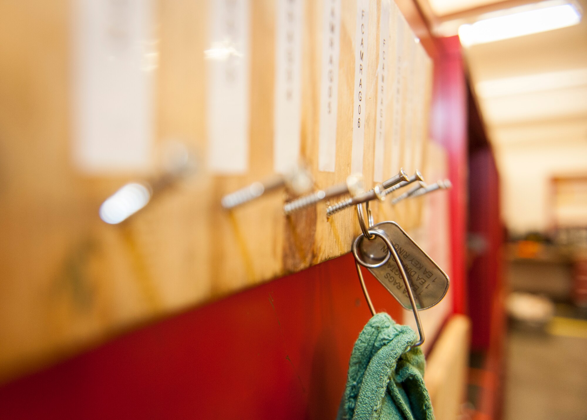 An aircraft rag hangs in stock waiting to be checked out for use in the 92nd Aircraft Maintenance Squadron’s consolidated tool kit at Fairchild Air Force Base, Wash., April 16, 2014. The 92nd AMXS CTK shop handles an average of nearly 5,000 tools every day. CTK is manned by maintainers of all walks of life from across their career field. (U.S. Air Force photo by Staff Sgt. Benjamin W. Stratton/Released)