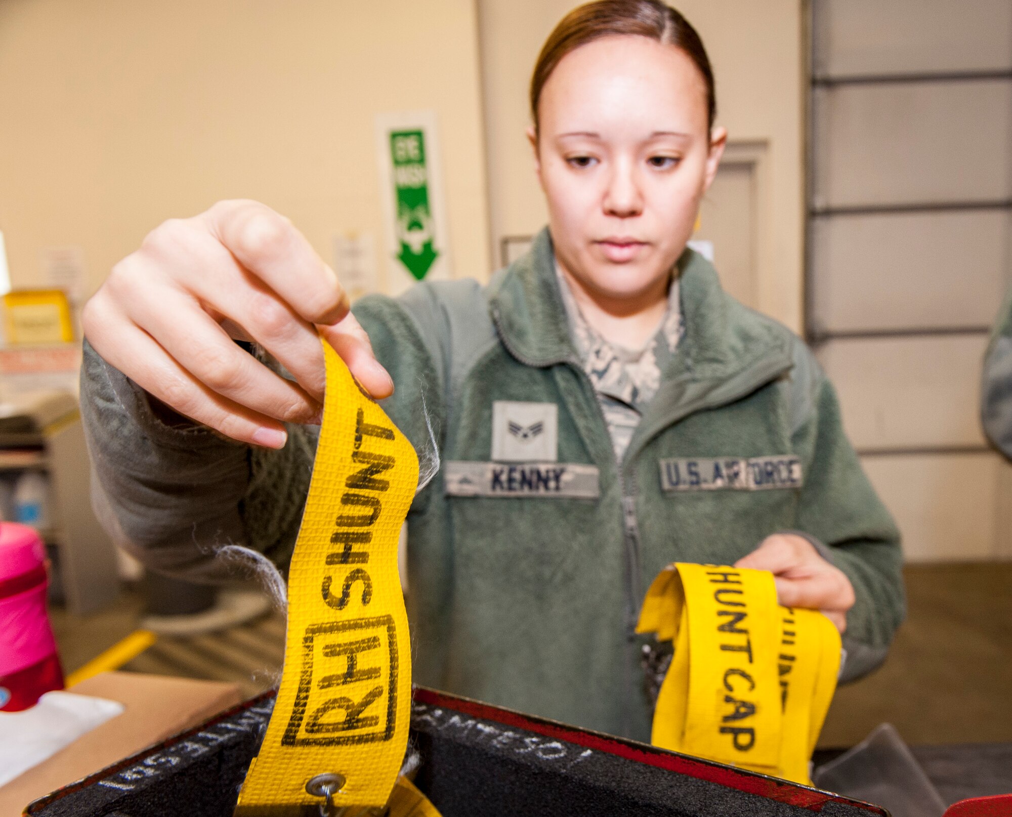 Senior Airman Shelby Kenny inventories her tools before signing them out for duty from the 92nd Aircraft Maintenance Squadron’s consolidated tool kit at Fairchild Air Force Base, Wash., April 16, 2014. The 92nd AMXS CTK shop handles an average of nearly 5,000 tools every day. Kenny is a 92nd AMXS electrical and environmental specialist and Sioux Falls, S.D., native. (U.S. Air Force photo by Staff Sgt. Benjamin W. Stratton/Released)
