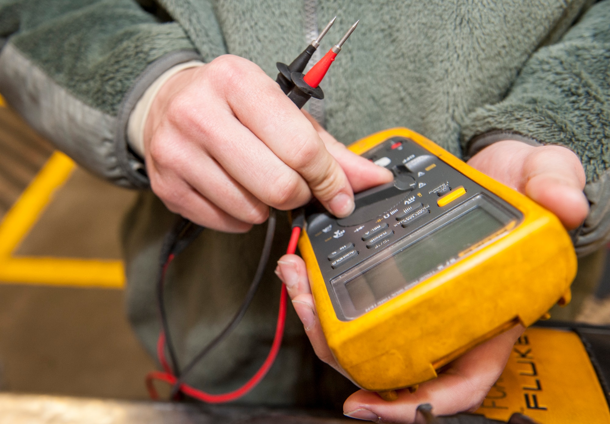 Senior Airman David Grove inspects his tools before signing them out for duty from the 92nd Aircraft Maintenance Squadron’s consolidated tool kit at Fairchild Air Force Base, Wash., April 16, 2014. The 92nd AMXS CTK shop handles an average of nearly 5,000 tools every day. Grove is a 92nd AMXS electrical and environmental specialist and Springfield, Ill., native. (U.S. Air Force photo by Staff Sgt. Benjamin W. Stratton/Released)