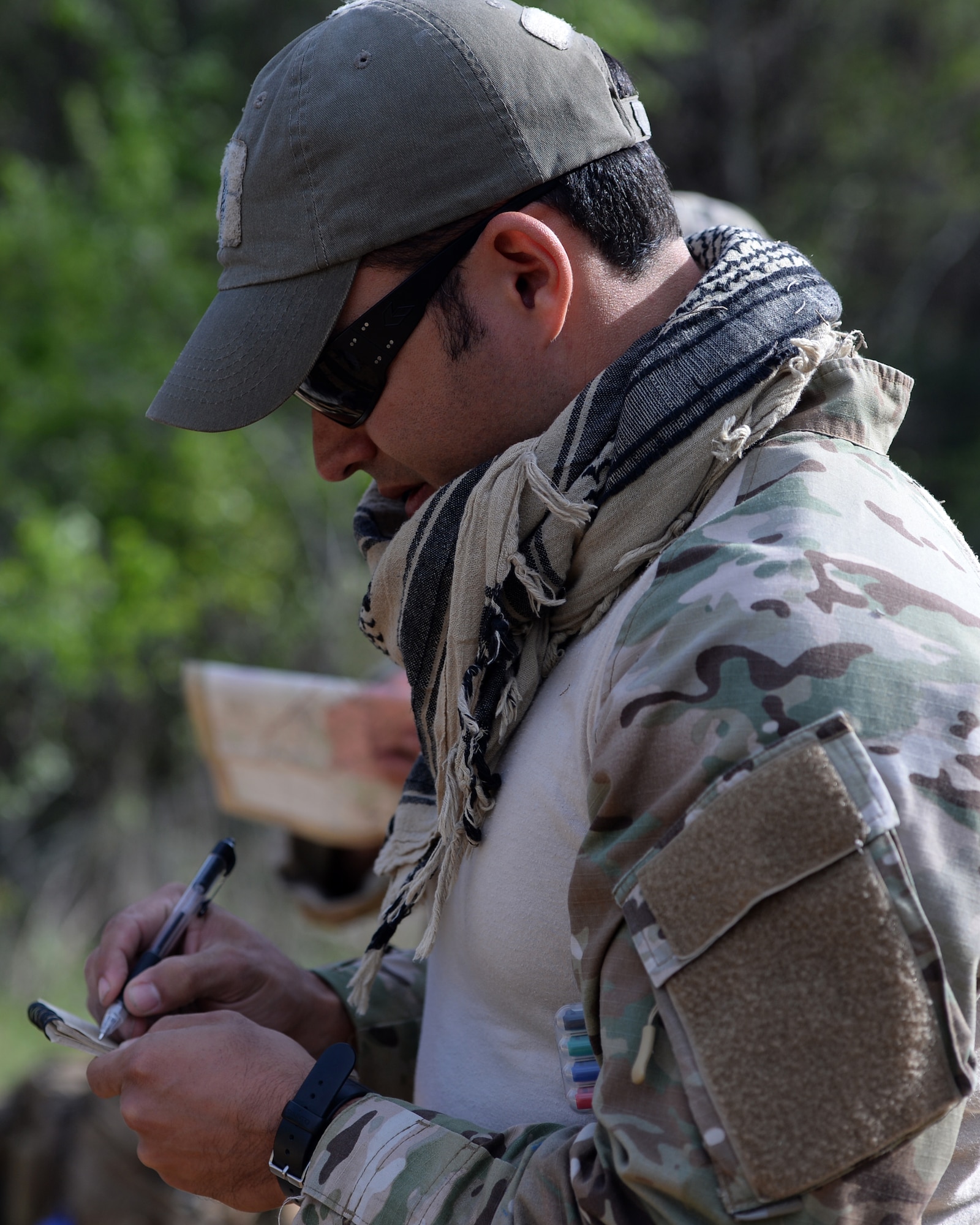 A tactical air control party member from the 147th Air Support Operations Squadron, 147th Reconnaissance Wing, based at Ellington Field Joint Reserve Base in Houston, Texas, prepare to navigate to their first point during a land navigation exercise at Camp Swift in Bastrop, Texas. The squadron travelled to the camp to perform a weeklong field training exercise that allowed the members to maintain their proficiency in their career field.
