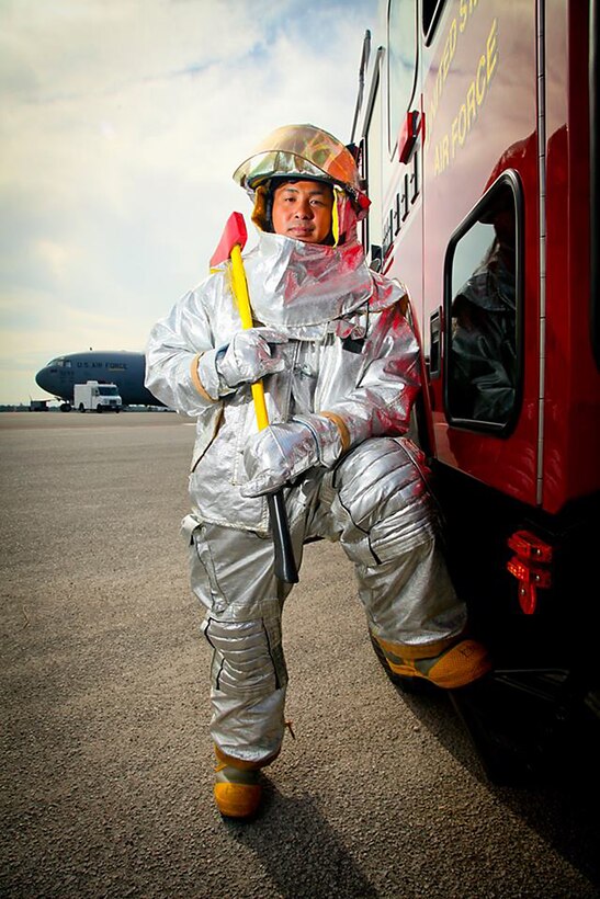 This is one of the photos taken by Staff Sgt. Rashard Coaxum, 315th Airlift Wing Public Affairs,. during a training course with the 1st Combat Camera Squadron this week. In this photo he captures "environmental" photos of two firefighters training on the Charleston flight line.  About 23 Air Force Reserve public affairs specialists from bases across the country showed up at Joint Base Charleston with an eagerness to improve their photo skills under the tutelage of some of the Air Force’s most elite photographers – 1st Combat Camera Airmen. (U.S. Air Force Reserve photo by Tech Sgt. Shane Ellis)