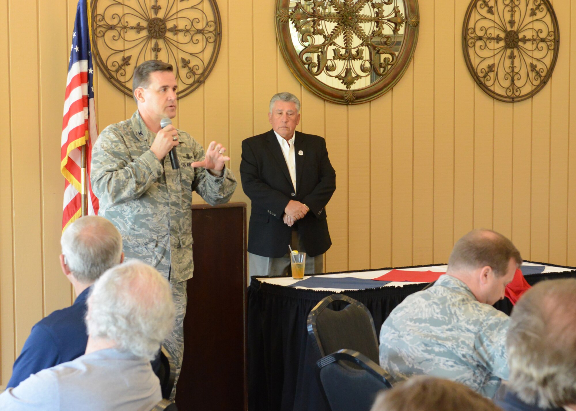 Col. Kevin Cavanagh, 940th Wing commander, speaks during an Honorary Commander Induction at the Peach Tree Golf & Country Club in Marysville, Calif., April 16, 2014. Honorary Commanders are a part of a public outreach program designed to increase the understanding of Air Force and Beale missions. (U.S. Air Force photo by John Schwab/Released)