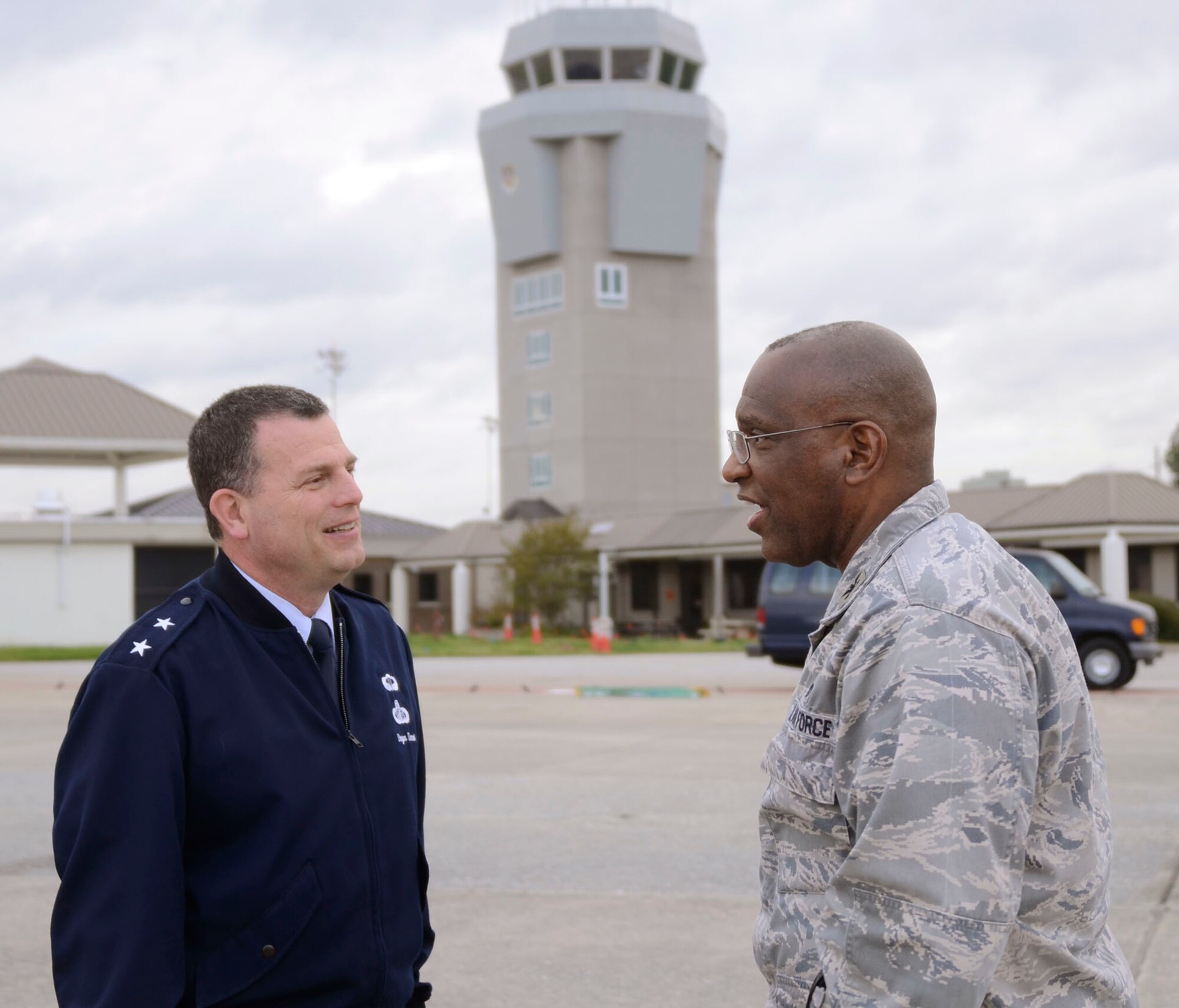 Col. Marshall S. Irvin, 94th Mission Support Group, commander welcomes Maj. Gen. Dwyer L. Dennis, Program Executive Officer for Fighters and Bombers, Air Force Life Cycle Management Center (AFLCMC), Air Force Materiel Command, Wright-Patterson Air Force Base, Ohio as he and his team of Wing Commanders lands at Dobbins Air Reserve Base, Ga. for an offsite conference April 14. (U.S. Air Force photo/Don Peek)