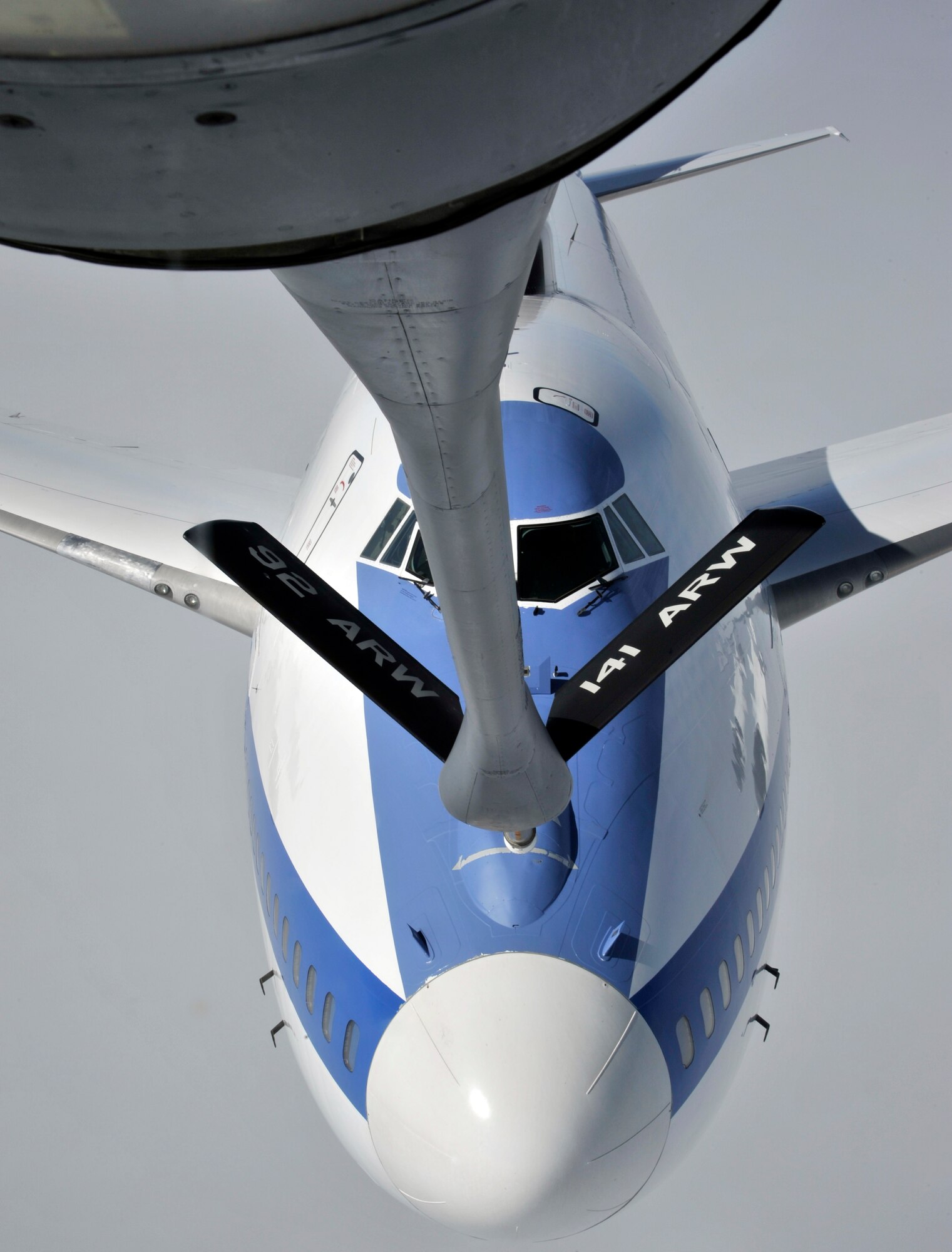 An Air Force E-4B approaches the boom of a KC-135 Stratotanker, assigned to Fairchild Air Force Base, over the Pacific coast, April 10, 2014. The E-4B serves as the National Airborne Operations Center for the president, secretary of defense and the Joint Chiefs of Staff.  In case of national emergency or destruction of ground command control centers, the aircraft provides a highly survivable, command, control and communications center to direct U.S. forces, execute emergency war orders and coordinate actions by civil authorities. (U.S. Air Force photo by Senior Airman Mary O'Dell/Released)