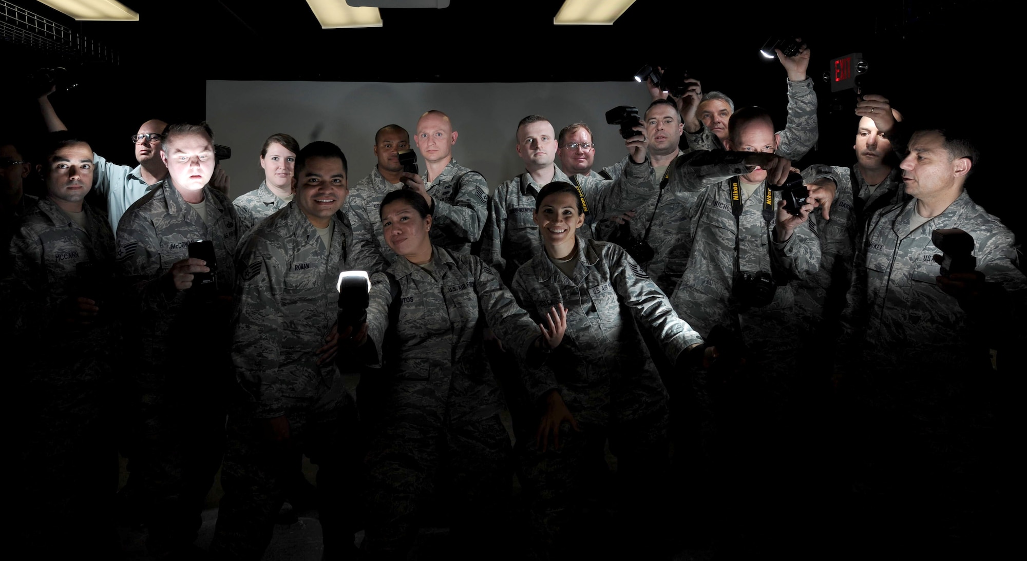 Reservist learn how to use multiple flashes to create unique photos during a training course with the 1st Combat Camera Squadron this week. About 23 Air Force Reserve public affairs specialists from bases across the country showed up at Joint Base Charleston with an eagerness to improve their photo skills under the tutelage of some of the Air Force’s most elite photographers – 1st Combat Camera Airmen. (U.S. Air Force photo by Tech Sgt. Denoris Mickle)