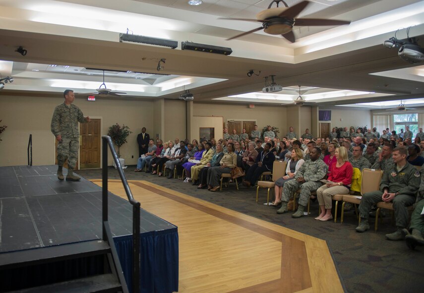 U.S. Air Force Col. Chad Franks, 23d Wing commander, speaks to a crowd during a volunteer recognition ceremony at Moody Air Force Base, Ga., April 17, 2014. Franks recognized and thanked individual volunteers and organizations ranging from the Key Spouse Program to the Air Force Sergeants Association for their volunteer work throughout the year. (U.S. Air Force photo by Senior Airman Jarrod Grammel/Released)
