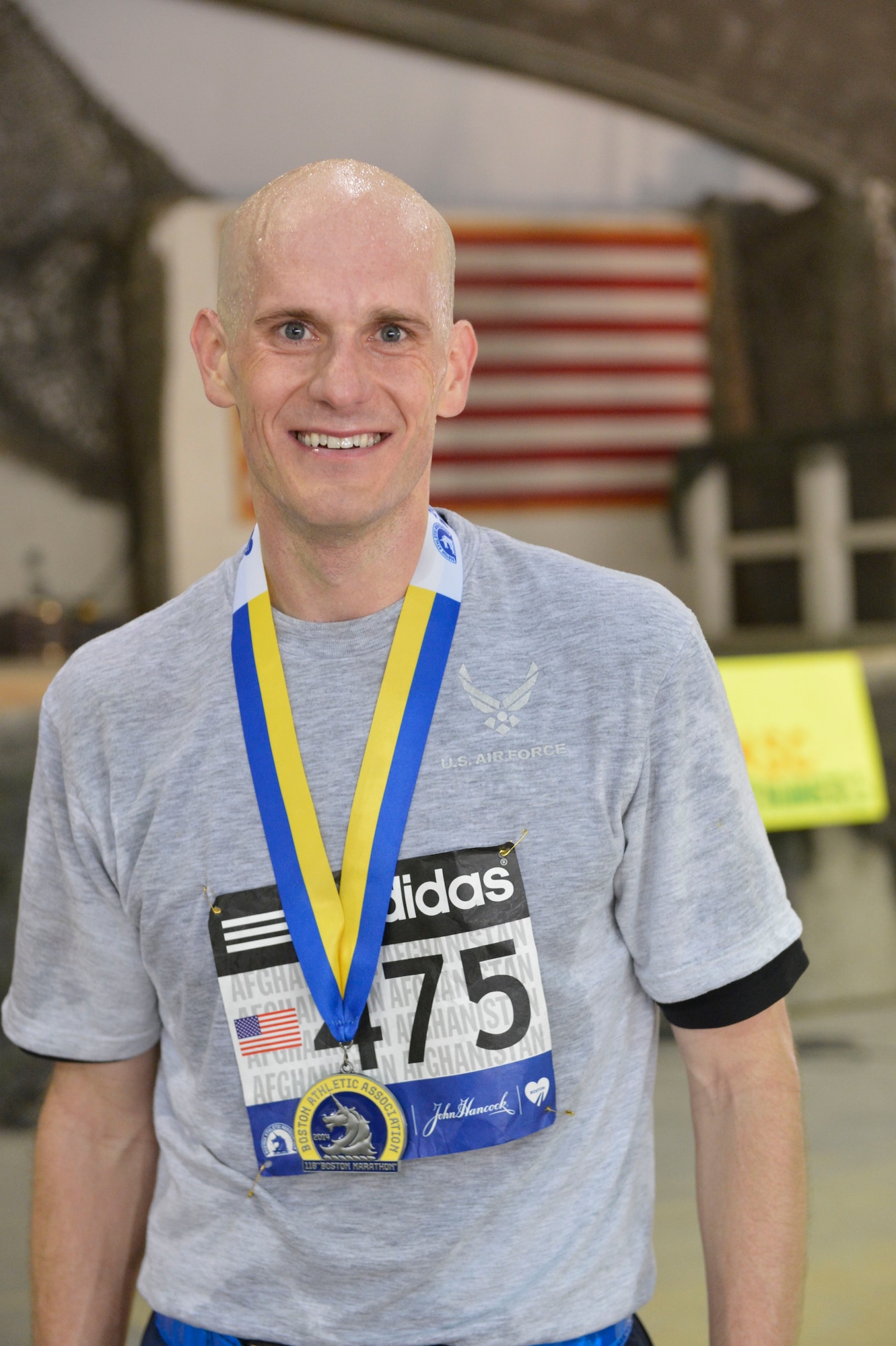 U.S. Air Force Major Scott Zakaluzny, deployed from Travis  Air Force Base, Cal., trauma czar at Craig Joint Theater Hospital at Bagram Airfield, Afghanistan, finished the Boston Marathon Shadow Run-Afghanistan 2014 with a time of 3:22:41. Over 600 runners participated in the race.(U.S. Air Force photo by Senior Master Sgt. Gary J. Rihn/Released)