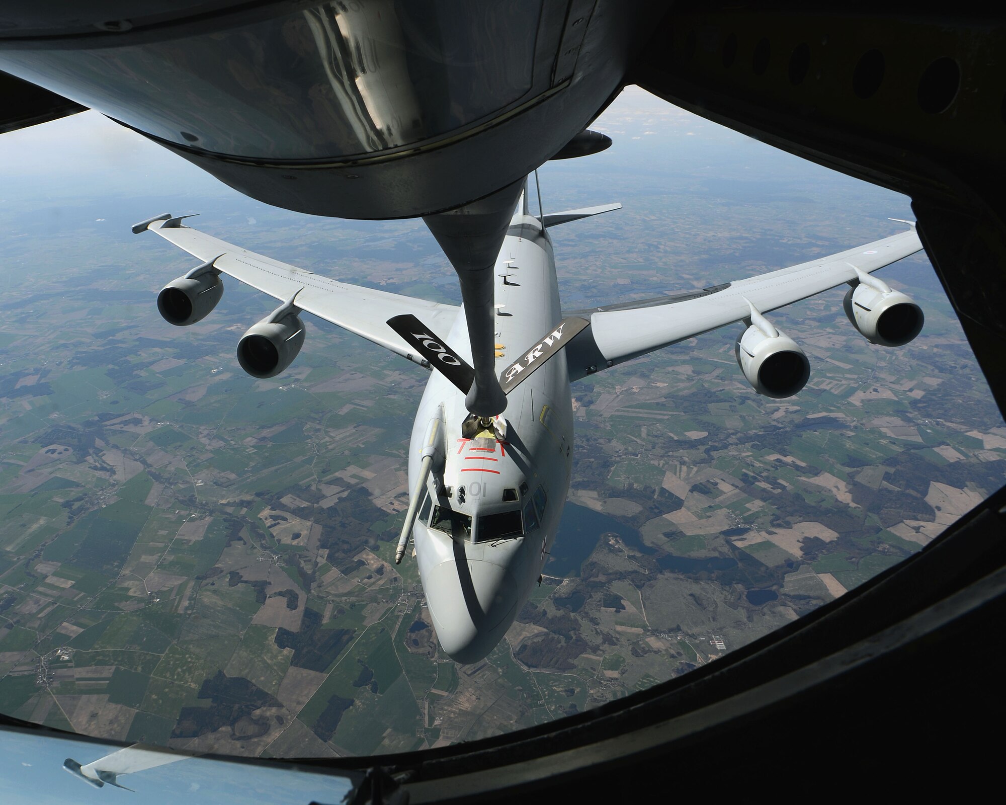 A 100th Air Refueling Wing KC-135 Stratotanker offloads fuel to a Royal Air Force E-3 Sentry, operating in a NATO capacity, April 17, 2014, over Eastern Europe. Since the start of fiscal year 2014, the 100th ARW flew more than 600 air-refueling missions. (U.S. Air Force photo by Airman 1st Class Preston Webb/Released)