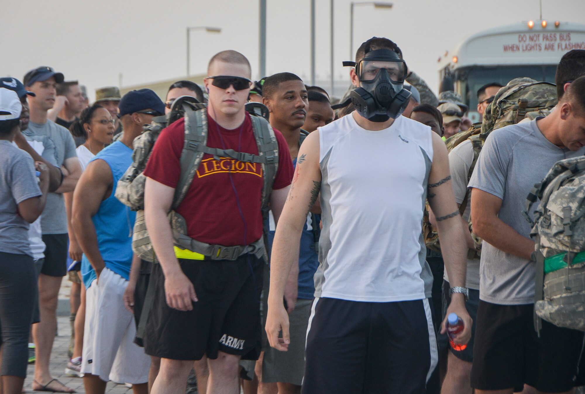 More than 200 Airmen, Marines, Sailors, Soldiers and Department of Defense civilians participated in a Bataan Death March remembrance run, walk and ruck event at Al Udied Air Base, Qatar, April 12, 2014. (U.S. Air Force photo/Senior Airman Jared Trimarchi) 