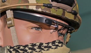A Google Glass test model rests on a dummy Airman at the 711th Human Performance Wing at Wright-Patterson Air Force Base, Ohio. Engineers and software designers with the Wing's Battlefield Air Targeting, Man-Aided Knowledge, or BATMA(N) group, here are currently testing Google Glass for possible use by battlefield Airman. The goal is to improve operators' situational awareness by allowing them to access real-time information through a hands-free, see-through heads-up display. (U.S. Air Force Base/Richard Eldridge)