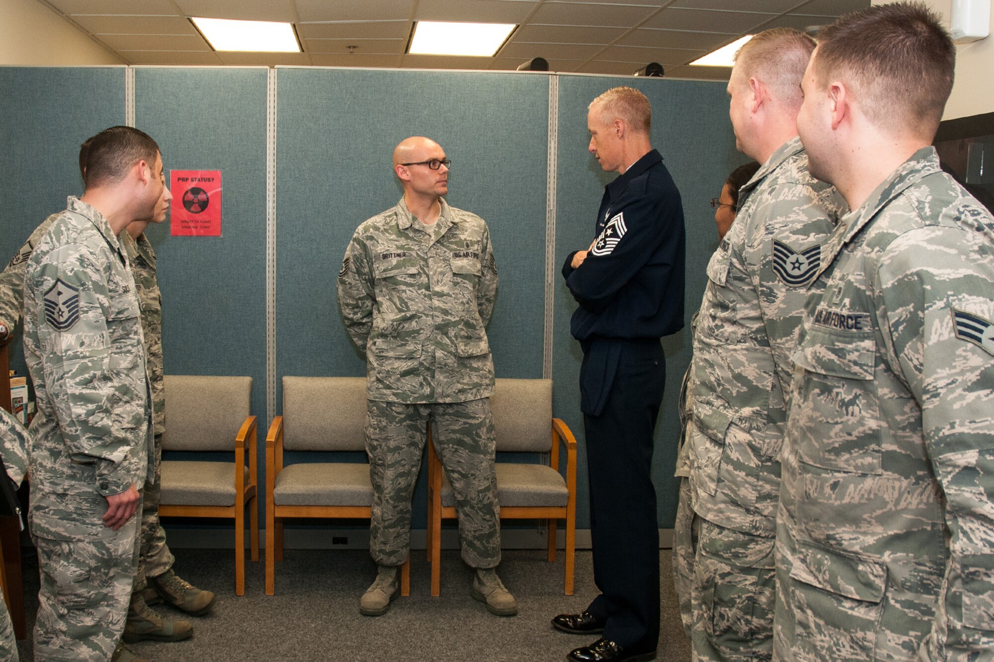 HANSCOM AIR FORCE BASE, Mass. – Command Chief Master Sgt. Michael Warner, Air Force Materiel Command’s senior enlisted member, speaks to Tech. Sgt. Scott Grittner, 66th Medical Squadron Medical Logistics NCO in charge, during a visit with Airmen at the clinic, April 16. Warner and Gen. Janet Wolfenbarger, commander of Air Force Materiel Command, visited the base April 14-16 to meet with Airmen. (U.S. Air Force photo by Mark Herlihy)